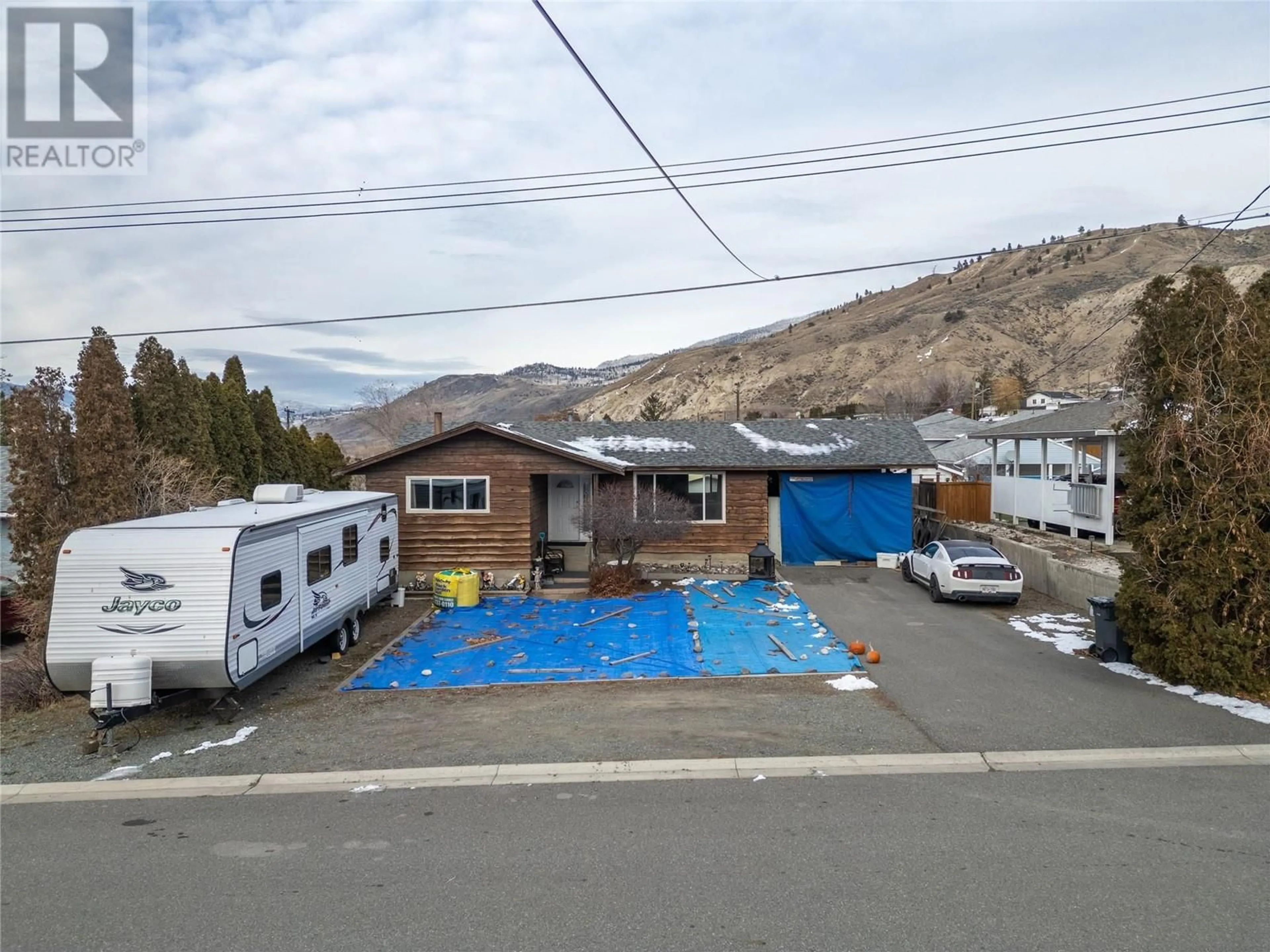 Frontside or backside of a home, the street view for 1105 Maclean Crescent, Cache Creek British Columbia V0K1H0