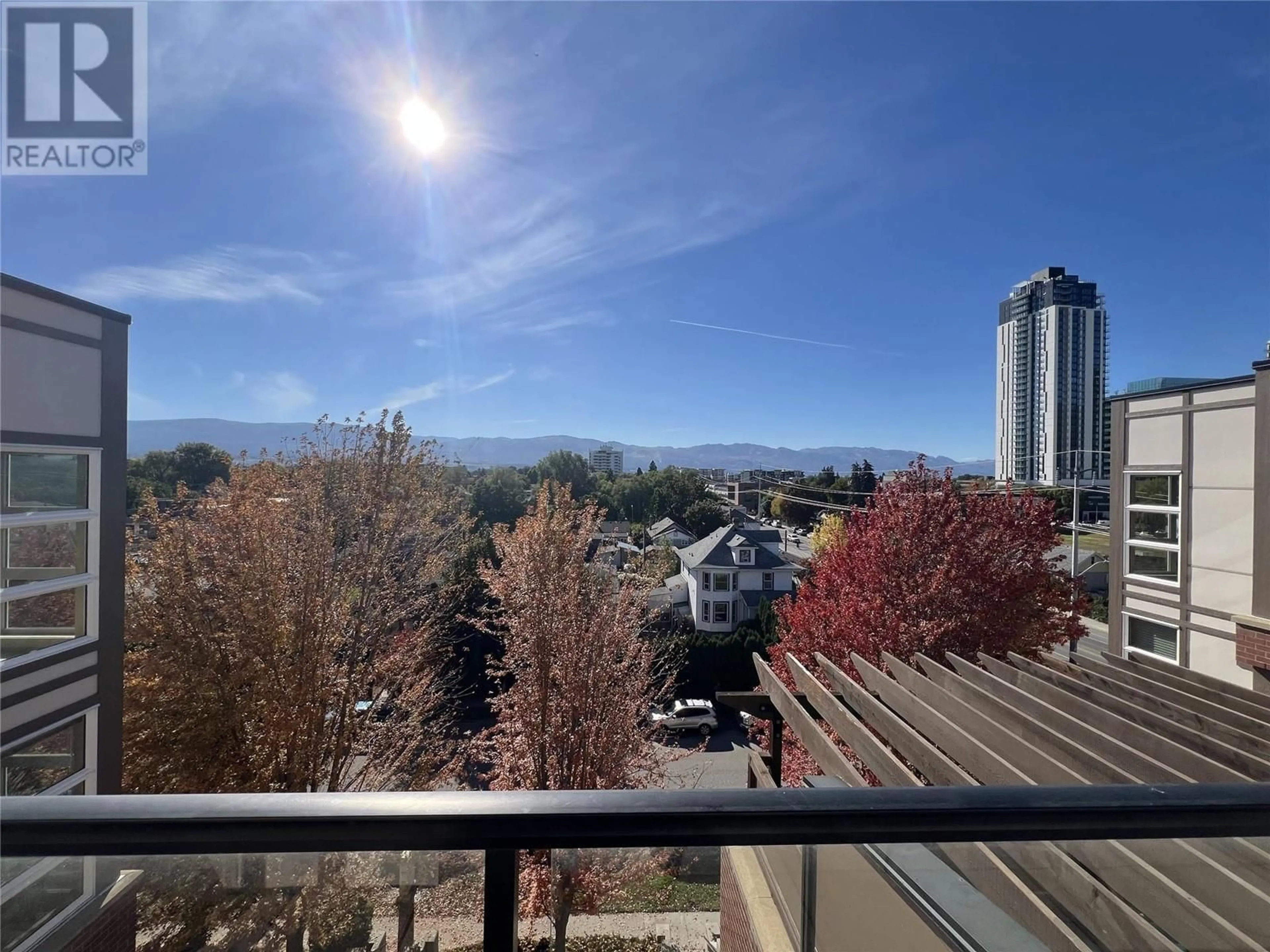 Balcony in the apartment, city buildings view from balcony for 409 - 700 MARTIN AVENUE, Kelowna British Columbia V1Y6V3