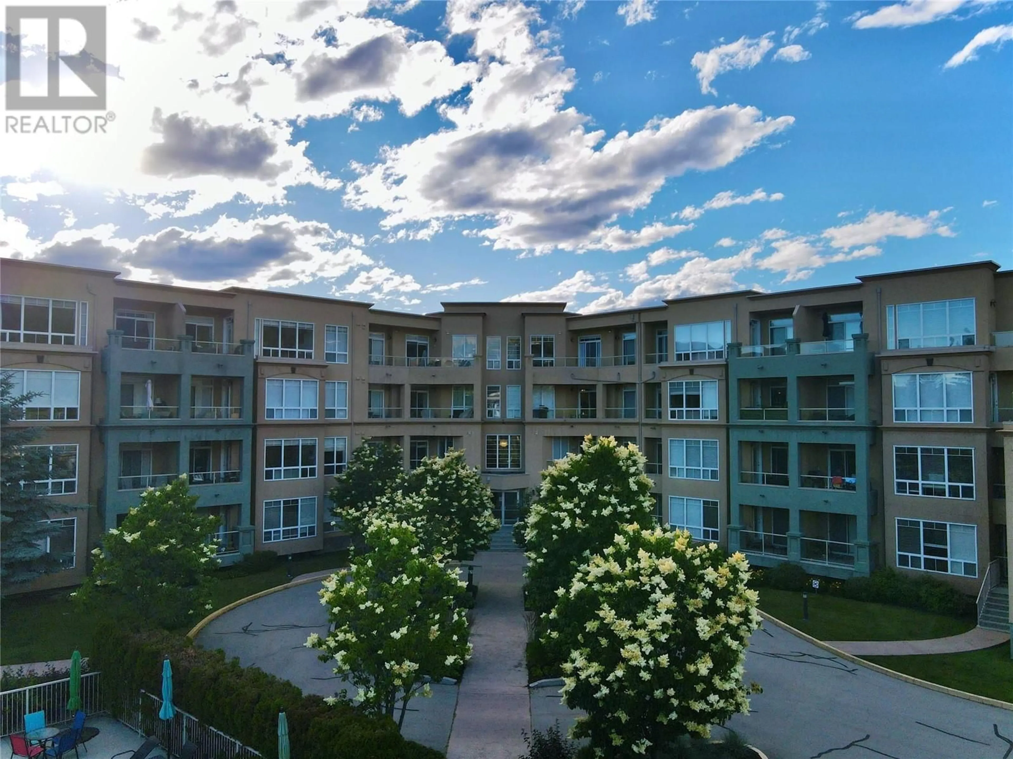 A pic from exterior of the house or condo, the street view for 3550 Woodsdale Road Unit# 206, Lake Country British Columbia V4V2P5