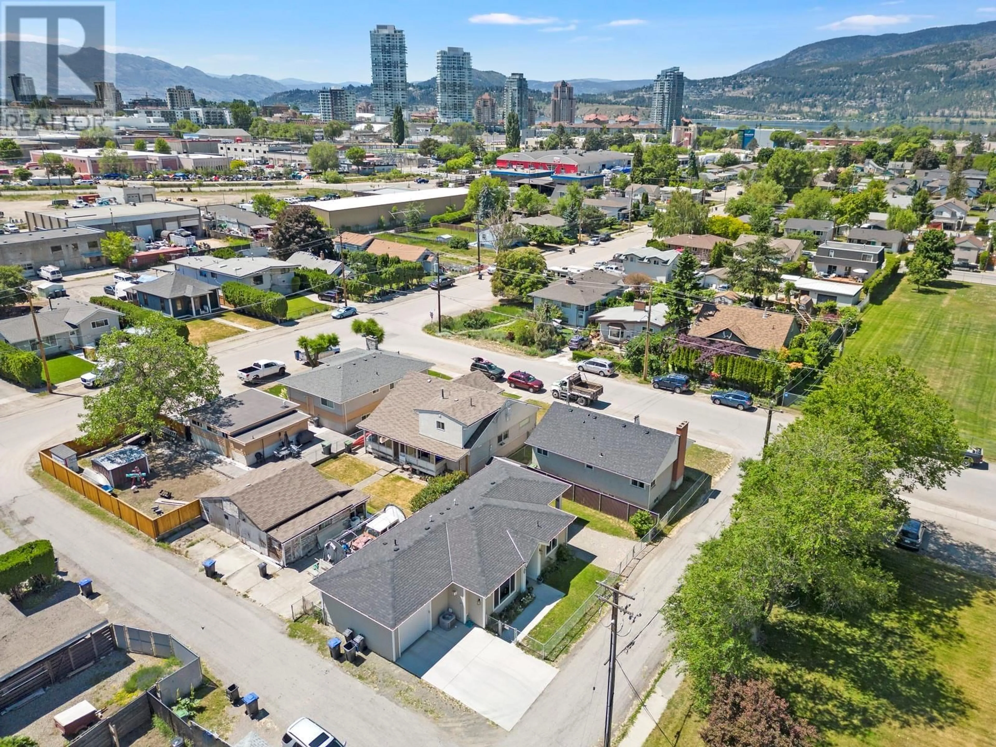 A pic from exterior of the house or condo, the view of city buildings for 875/877 Jones Street, Kelowna British Columbia V1Y2S6