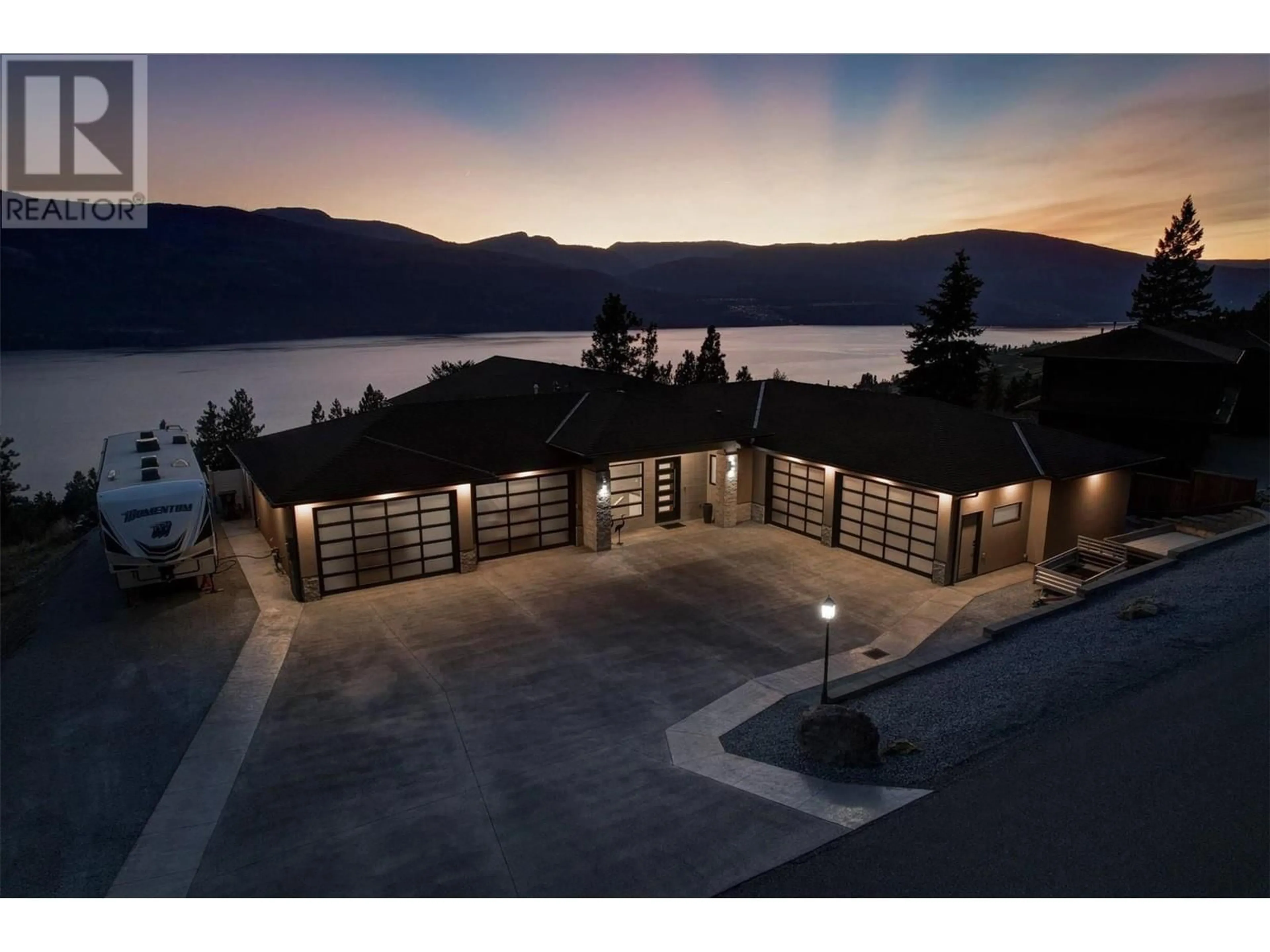 A pic from outside/outdoor area/front of a property/back of a property/a pic from drone, water/lake/river/ocean view for 13948 OGILVEY LANE, Lake Country British Columbia V4V2S8