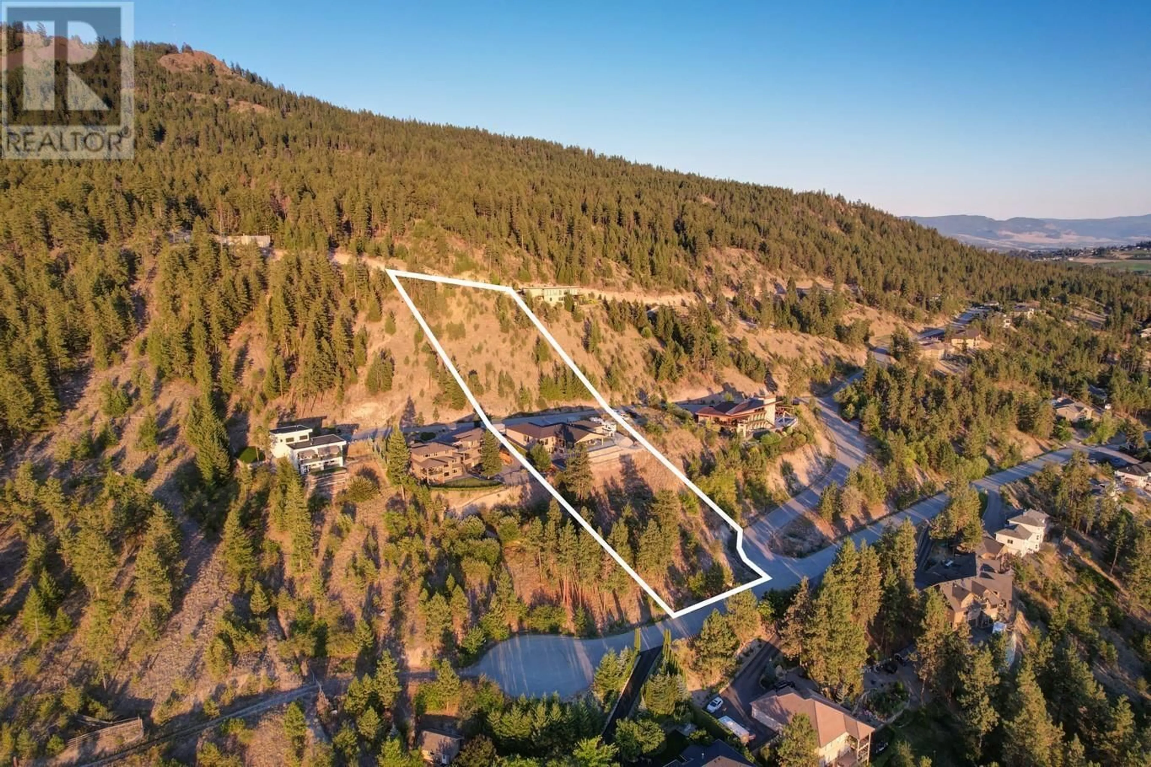 A pic from outside/outdoor area/front of a property/back of a property/a pic from drone, water/lake/river/ocean view for 13948 OGILVEY LANE, Lake Country British Columbia V4V2S8