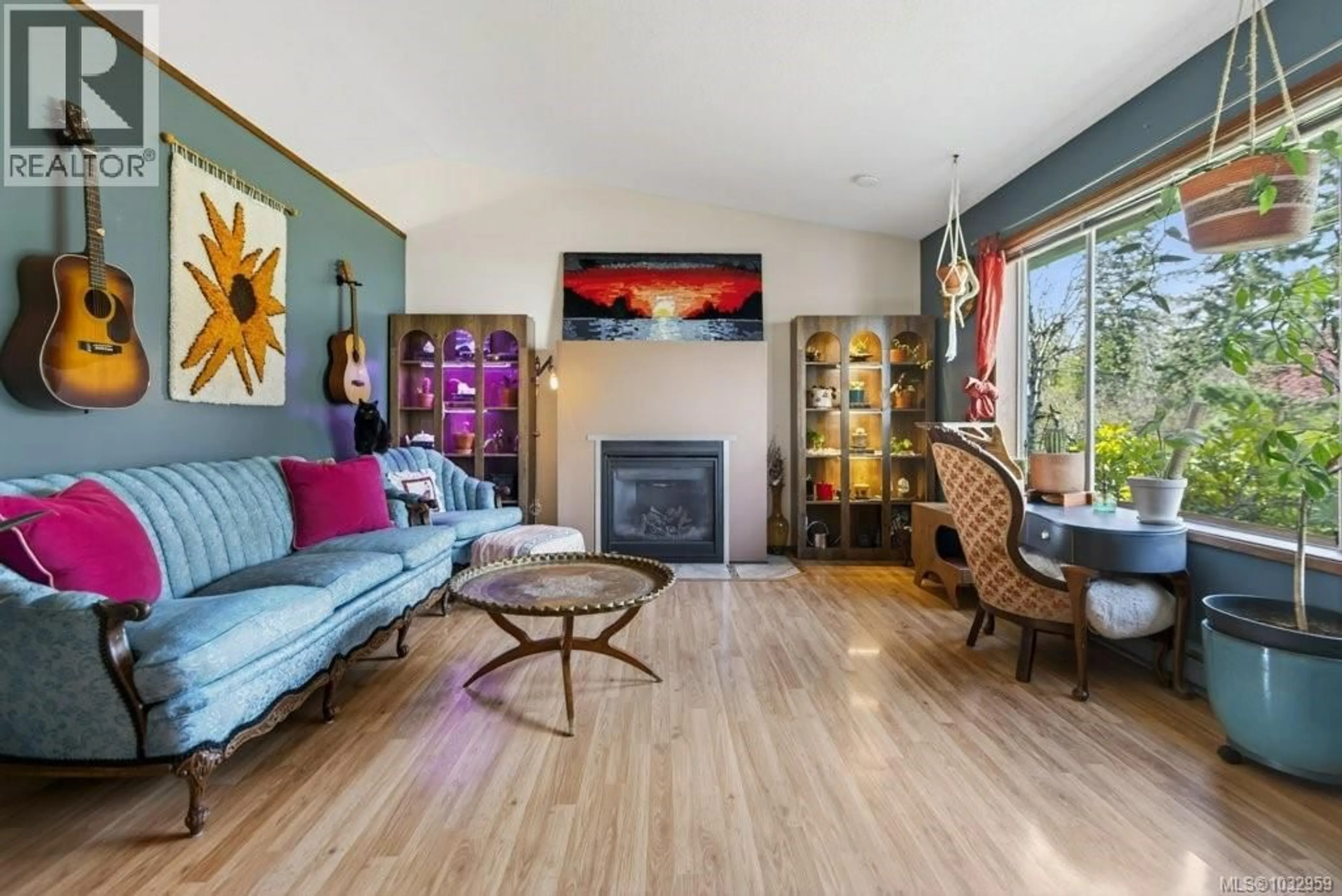 Living room with furniture, wood/laminate floor for 642 SOMENOS DRIVE, Comox British Columbia V9M1B5