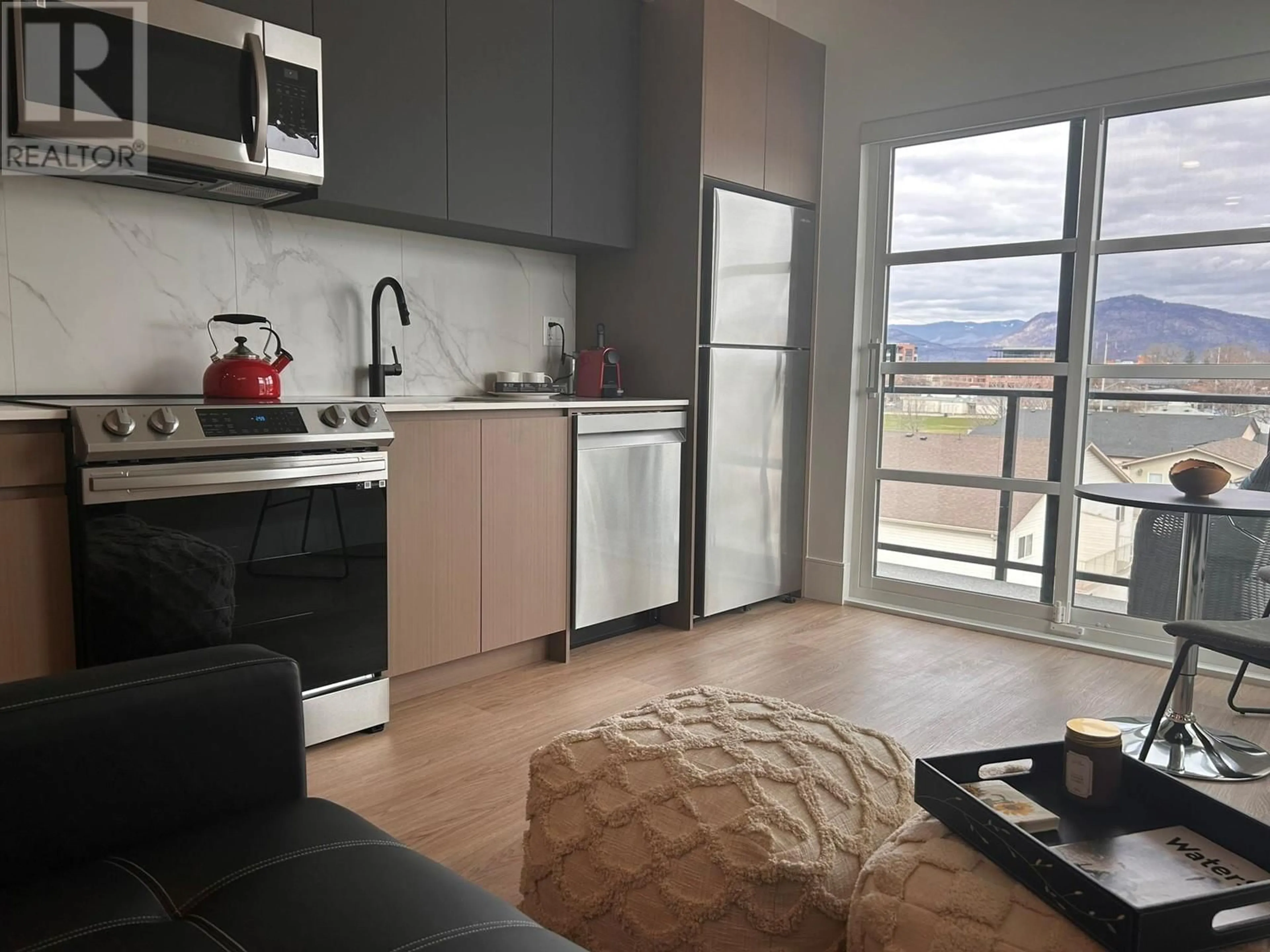 Open concept kitchen for 720 KLO Road Unit# 410, Kelowna British Columbia V1Y2R5