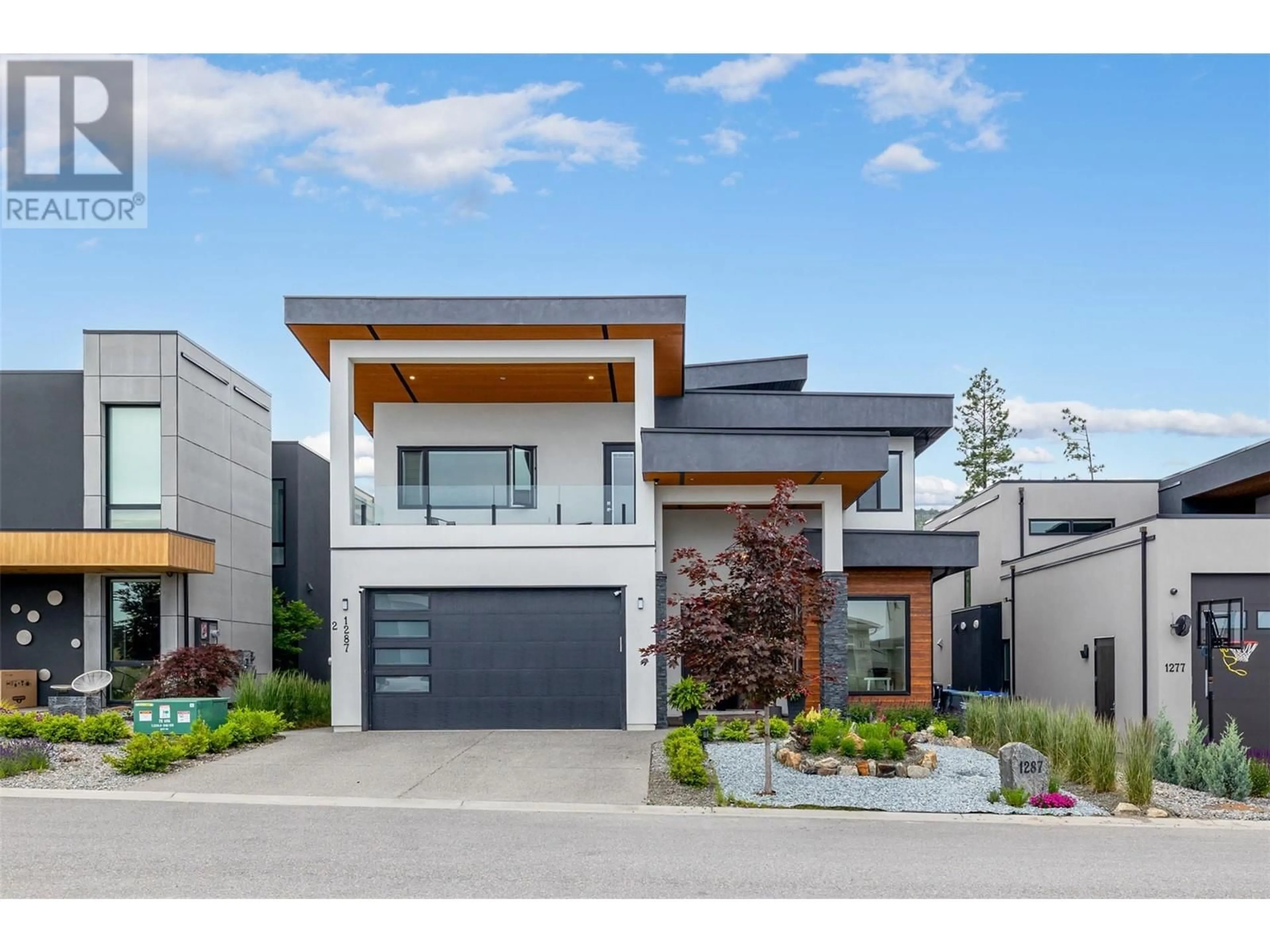 Home with vinyl exterior material, street for 1287 JACK SMITH ROAD, Kelowna British Columbia V1W5N1