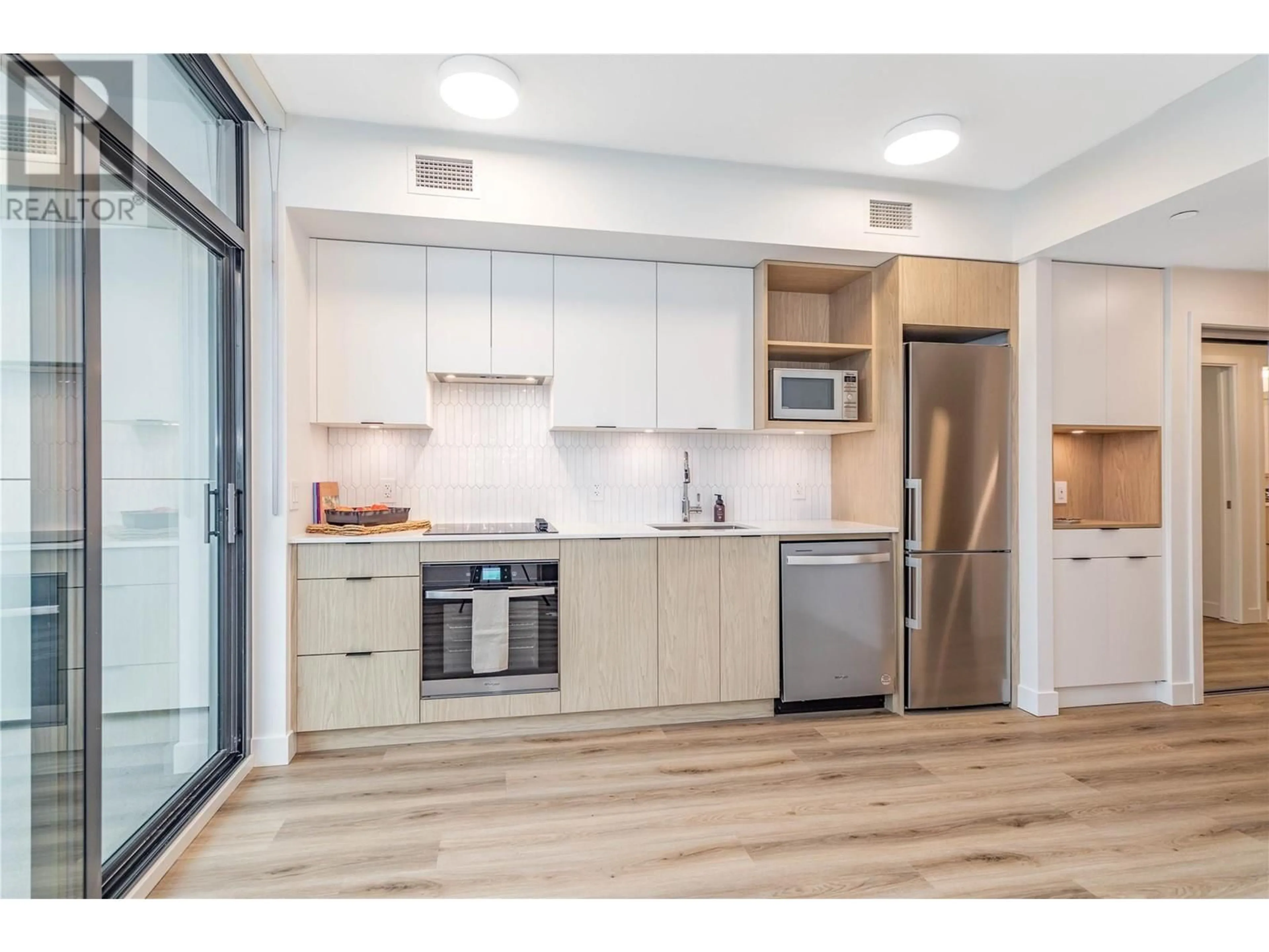 Standard kitchen, wood floors for 1488 Bertram Street Unit# 1811, Kelowna British Columbia V1Y0M6