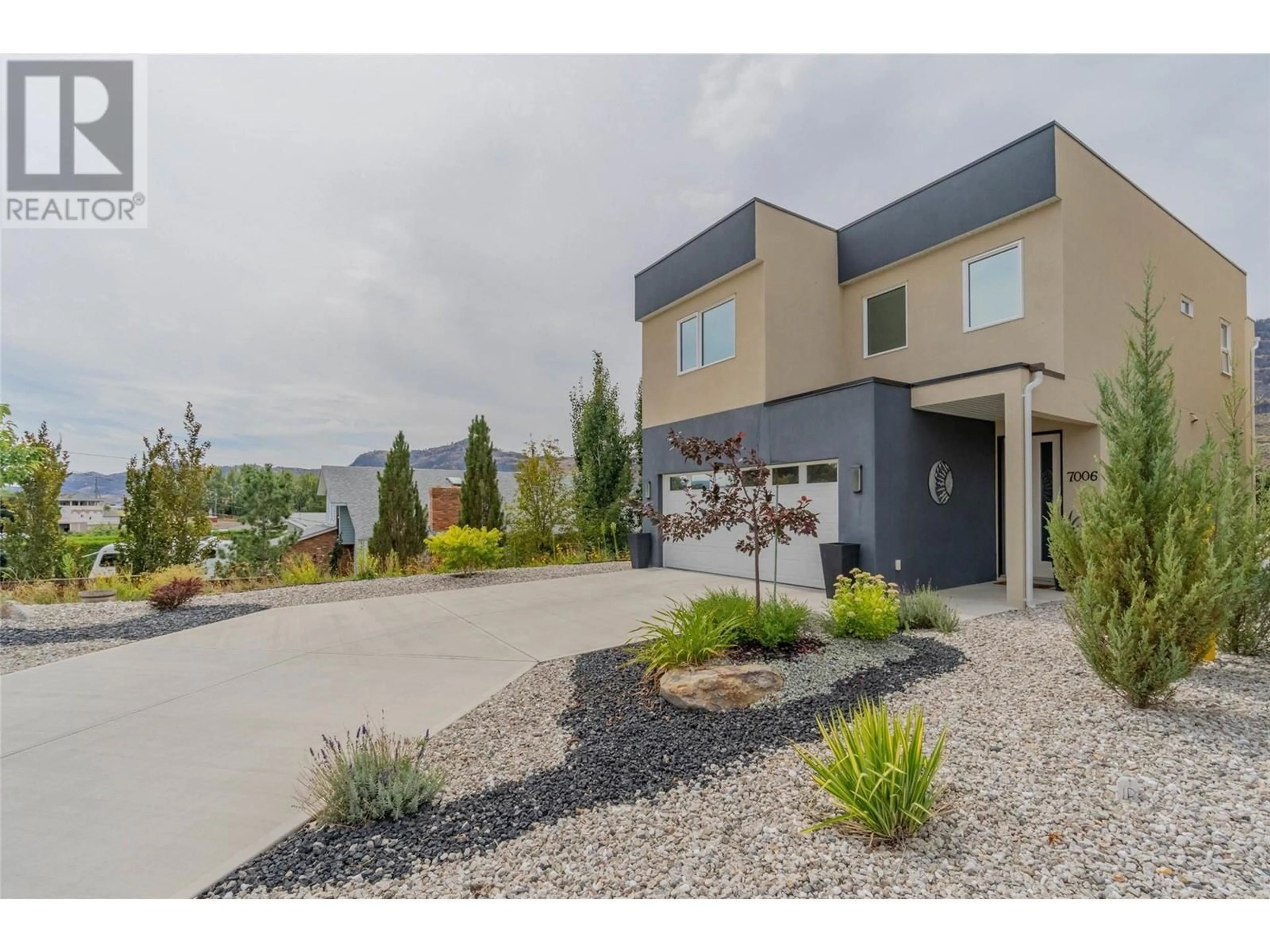 A pic from exterior of the house or condo, the street view for 7006 Wren Drive, Osoyoos British Columbia V0H1V6