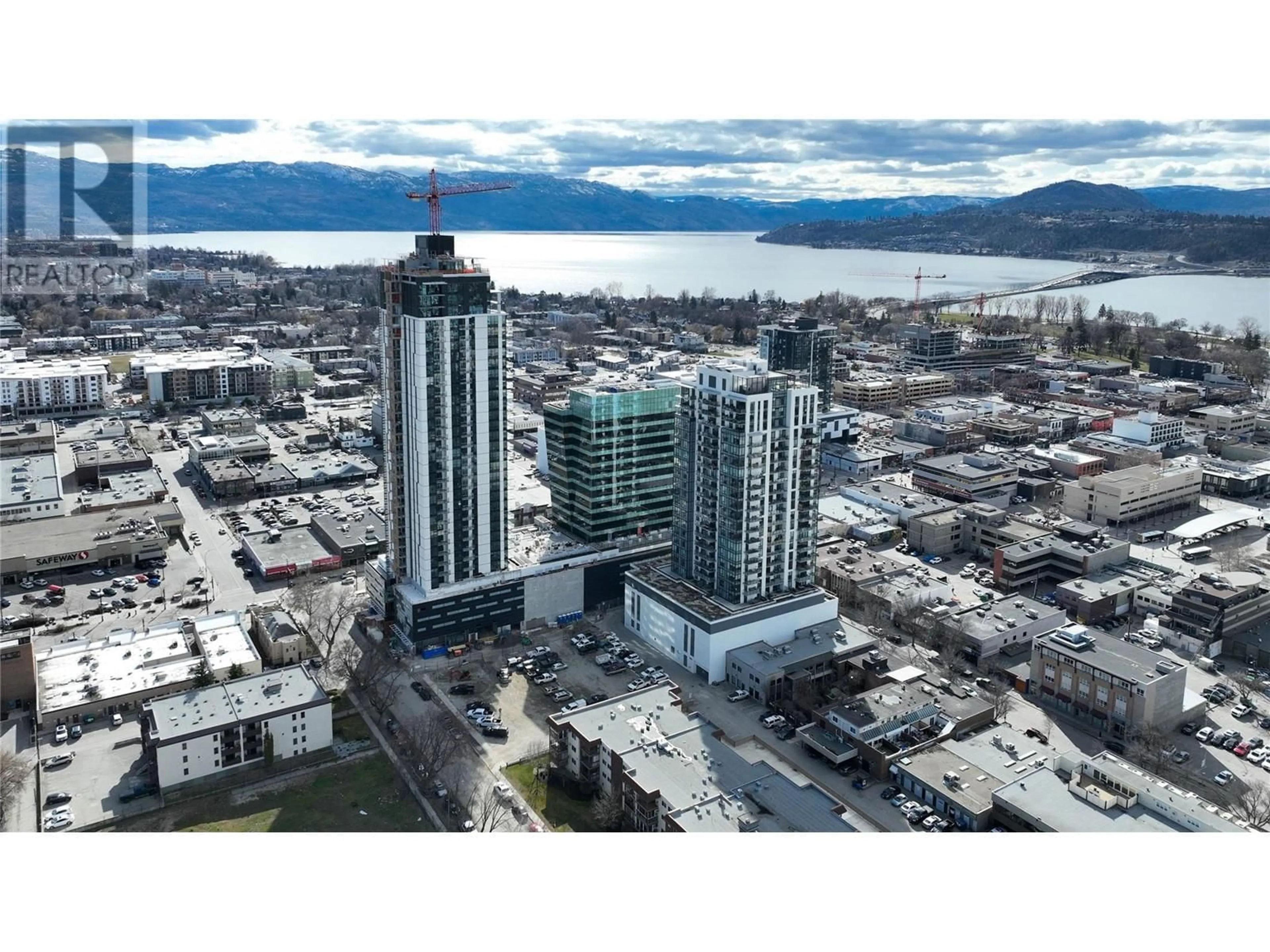 A pic from exterior of the house or condo, the view of city buildings for 1488 Bertram Street Unit# 1301, Kelowna British Columbia V1Y6P2