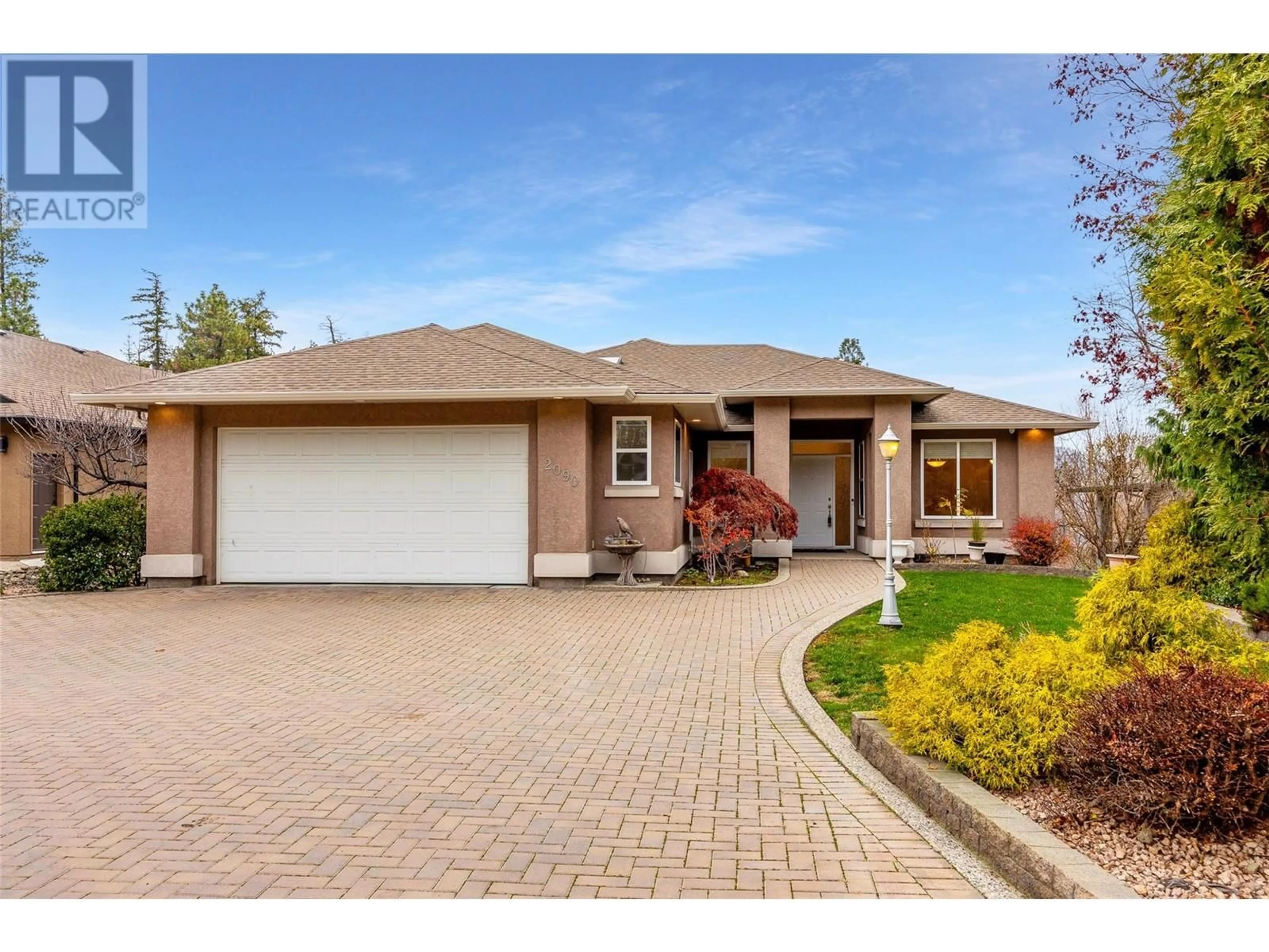 Frontside or backside of a home, the street view for 2090 Bowron Street, Kelowna British Columbia V1V2P2