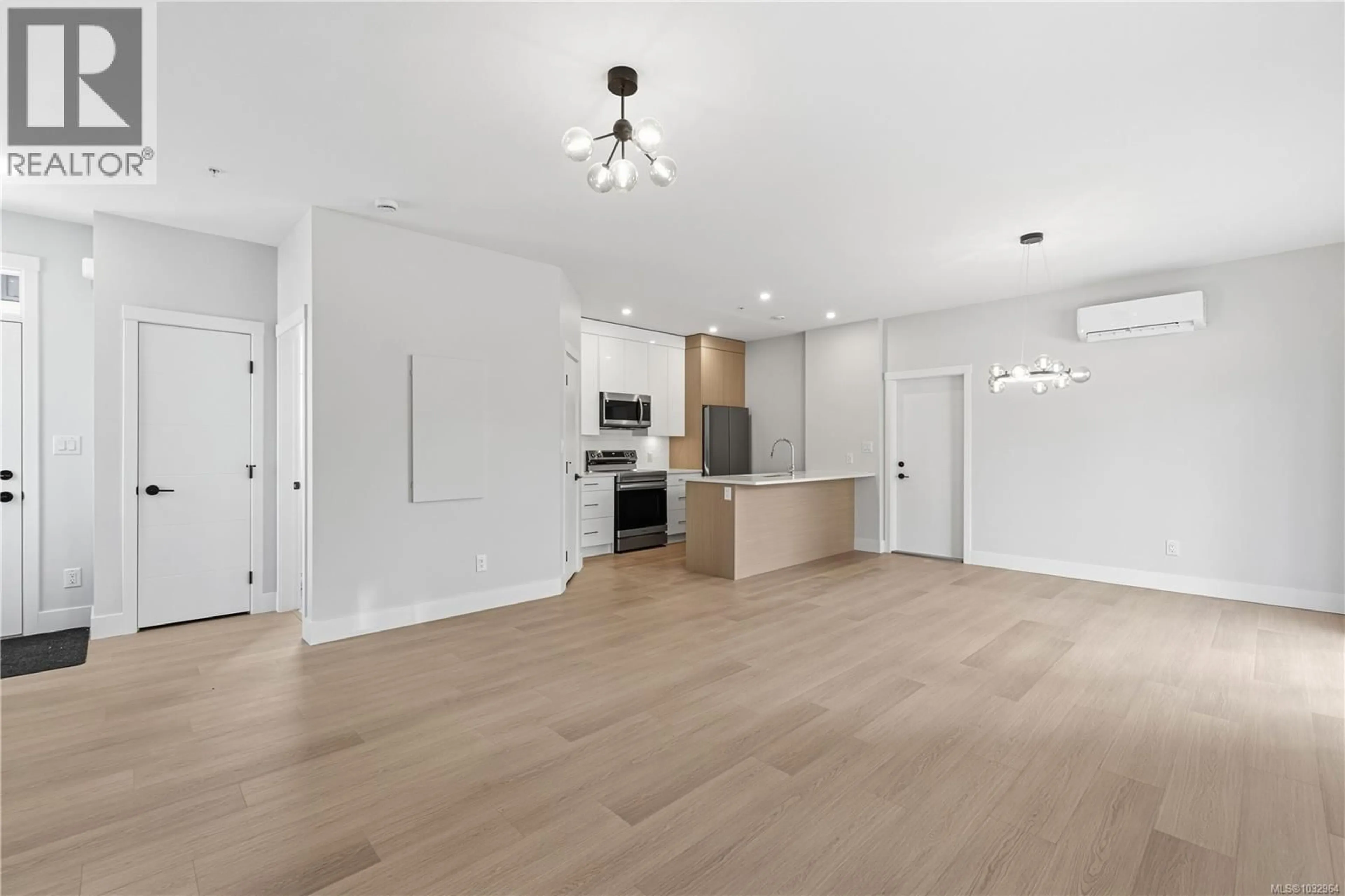 Open concept kitchen, wood/laminate floor for 163 ALBERTA ROAD, Nanaimo British Columbia V9X1A1