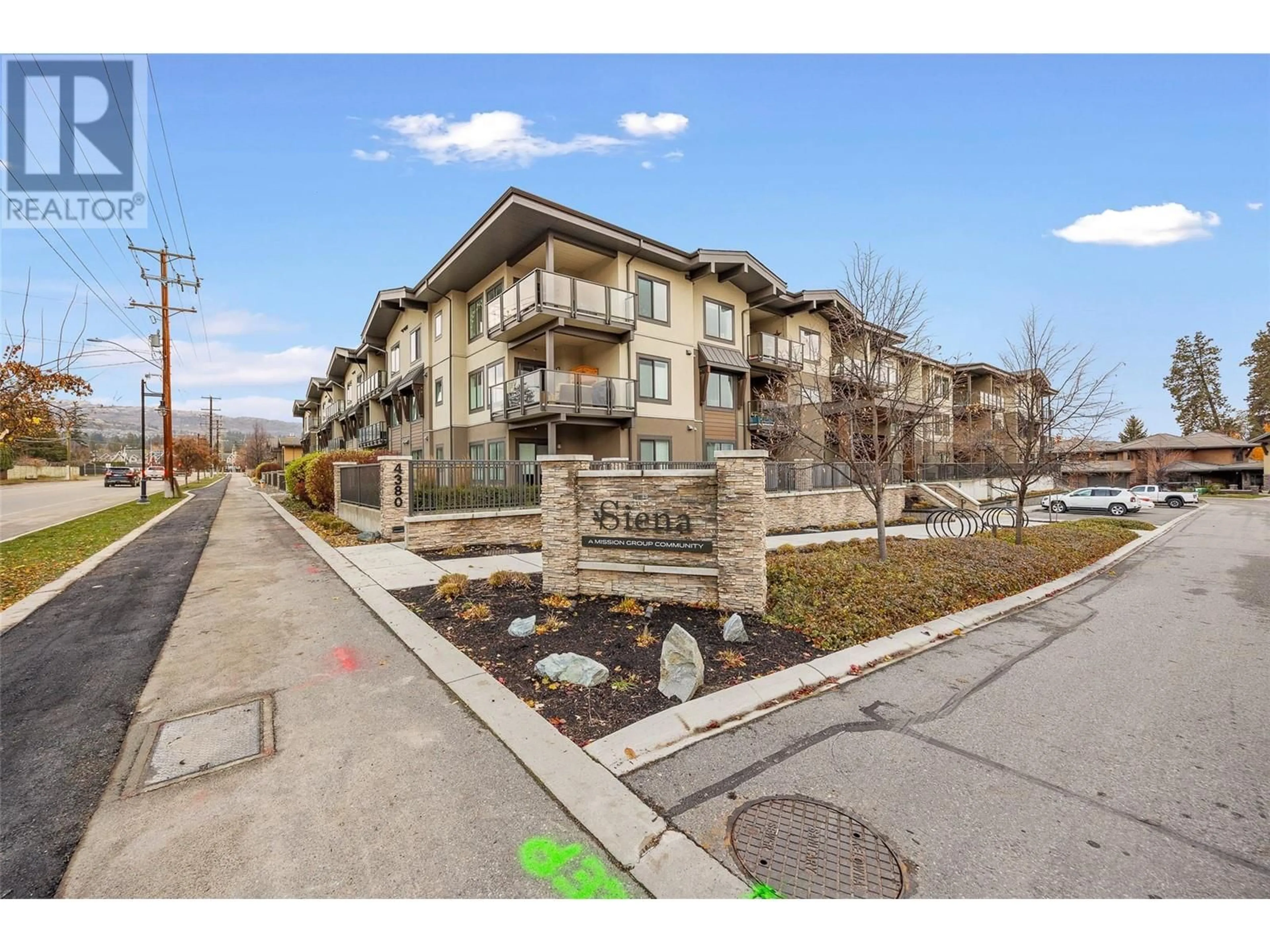 A pic from exterior of the house or condo, the street view for 4380 Lakeshore Road Unit# 107, Kelowna British Columbia V1W5N3