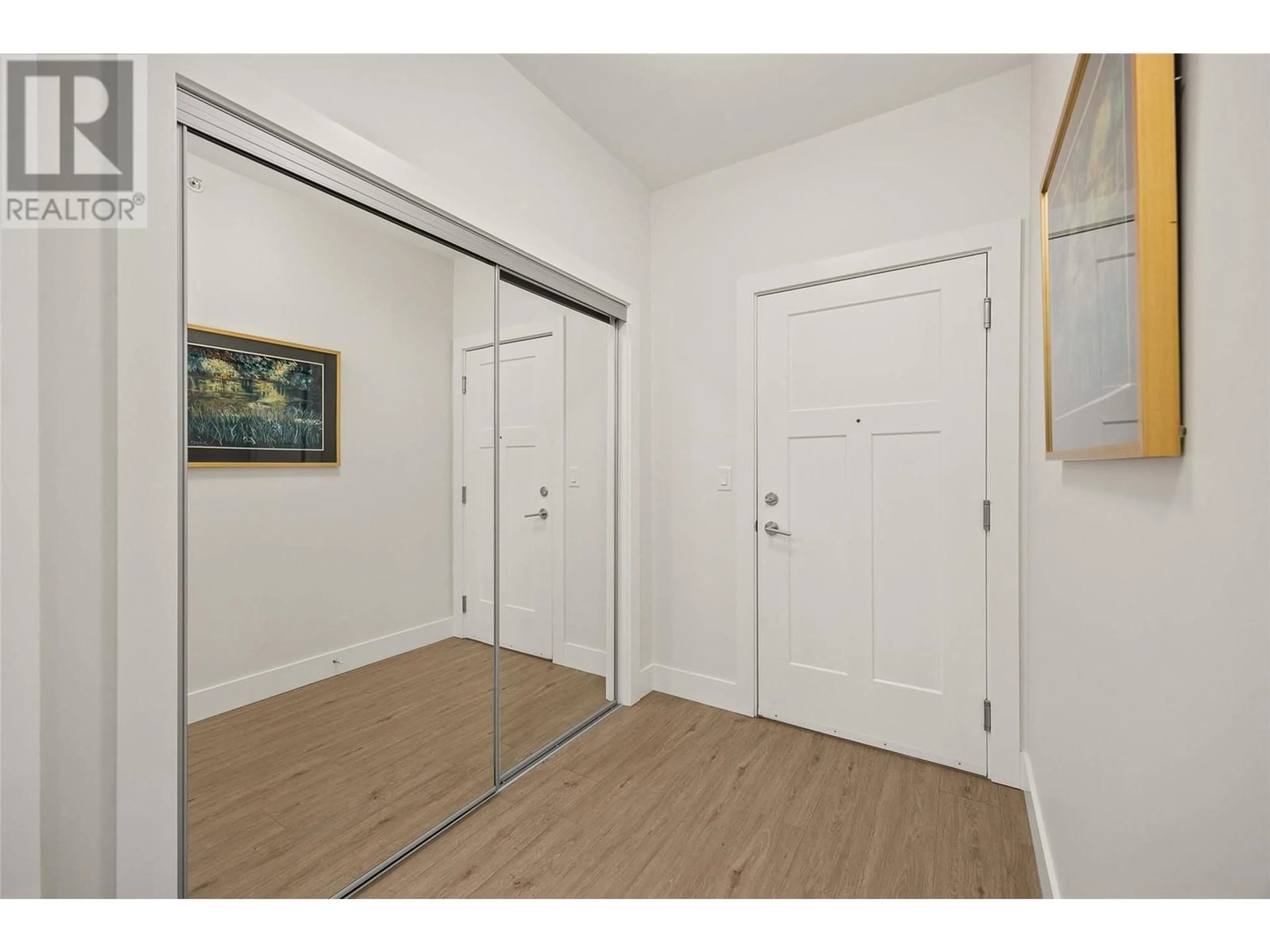 Indoor entryway, wood floors for 4380 Lakeshore Road Unit# 107, Kelowna British Columbia V1W5N3