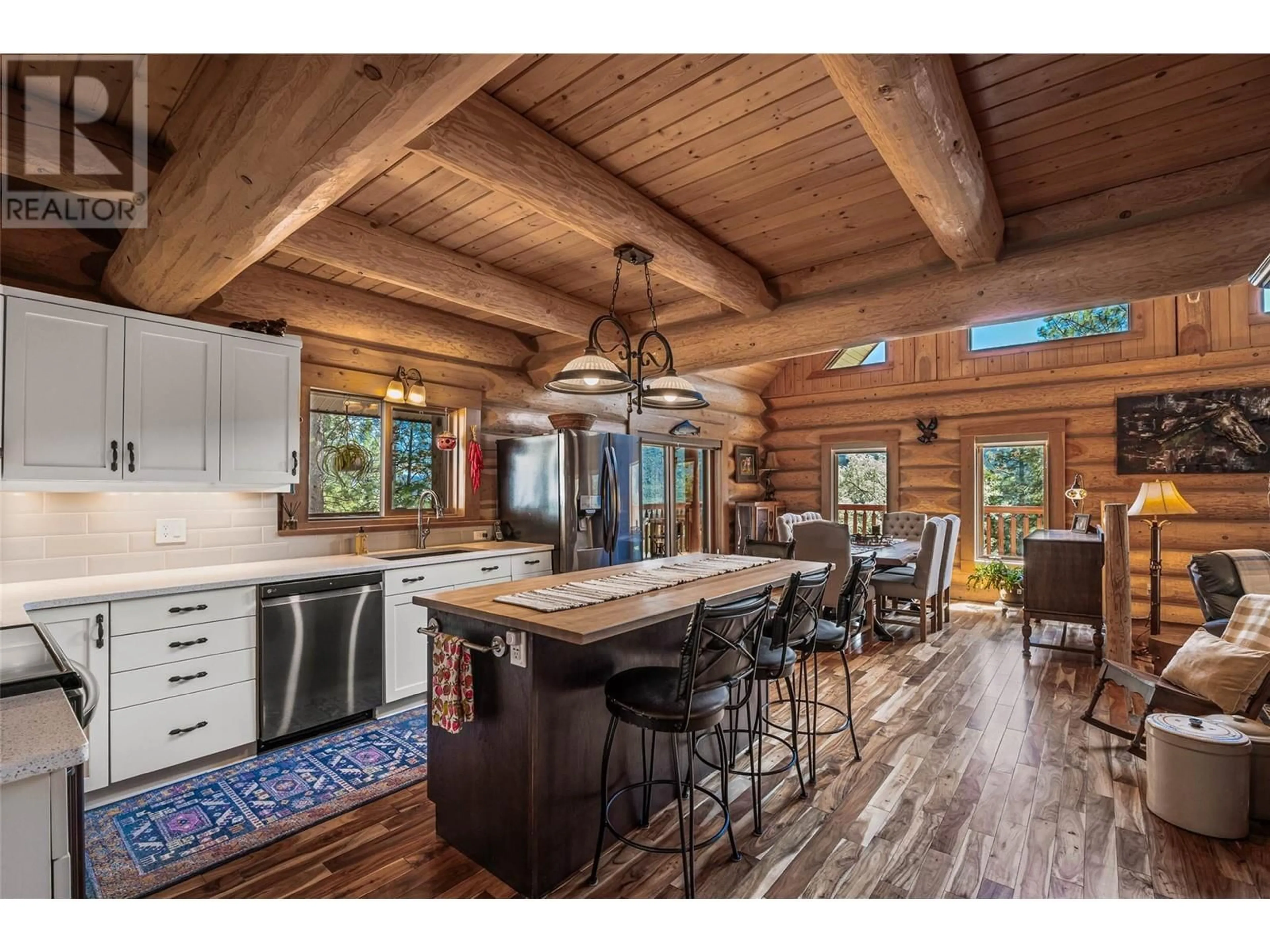 Open concept kitchen, wood/laminate floor for 1761 MILLER ROAD, Merritt British Columbia V1K1R8