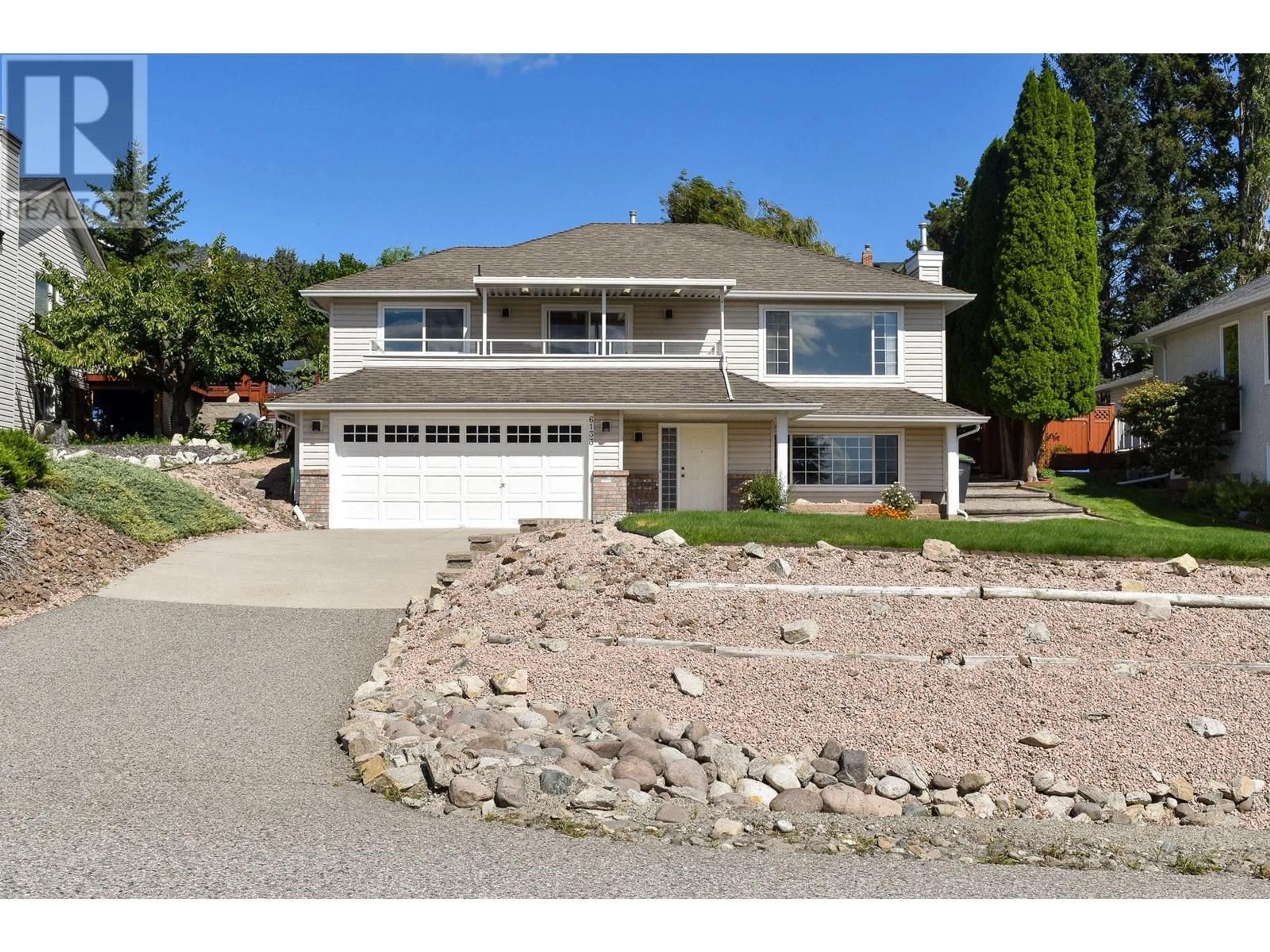 Frontside or backside of a home, the street view for 6133 Aitkens Road, Peachland British Columbia V0H1X7