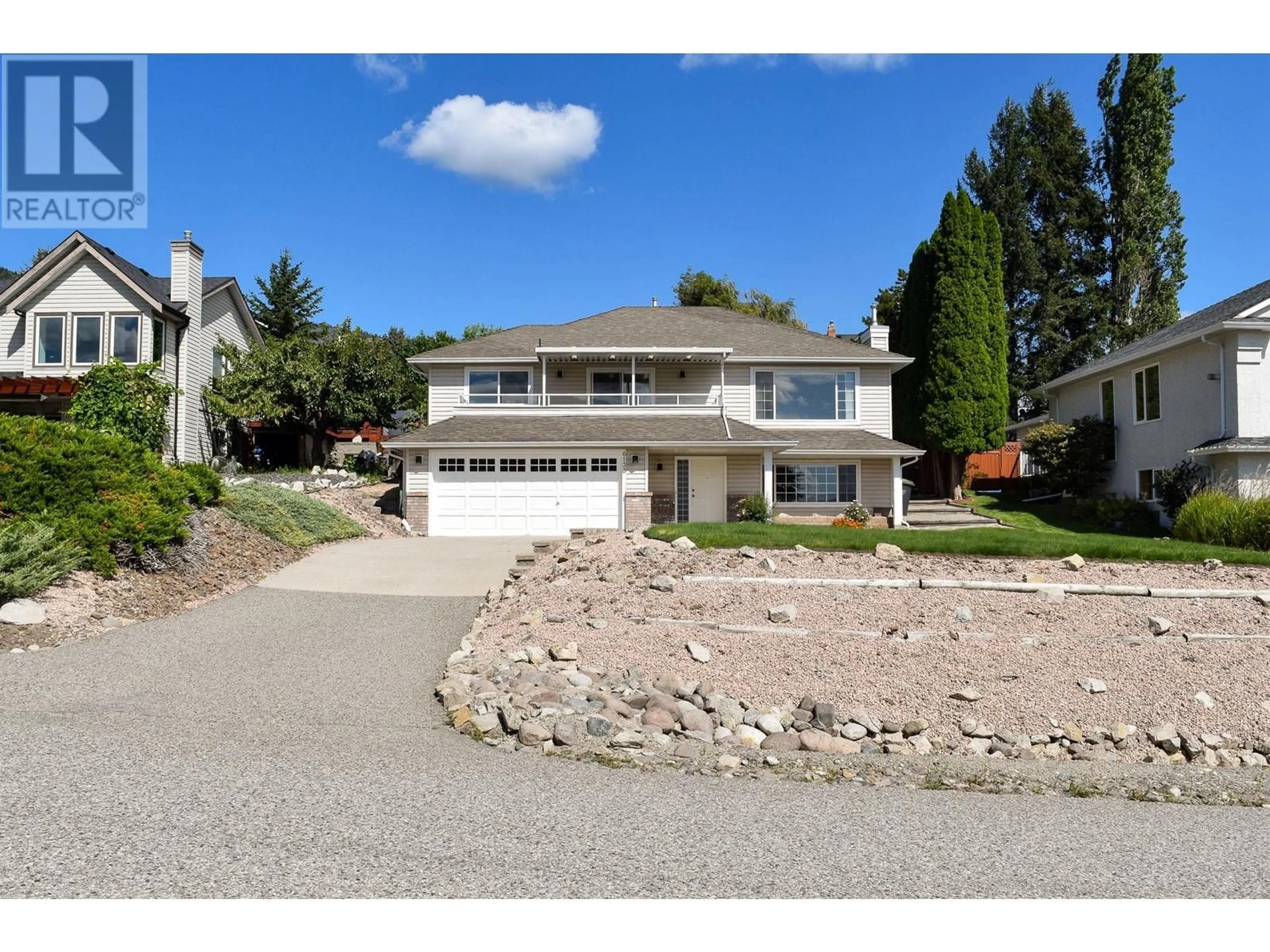 Frontside or backside of a home, the street view for 6133 Aitkens Road, Peachland British Columbia V0H1X7