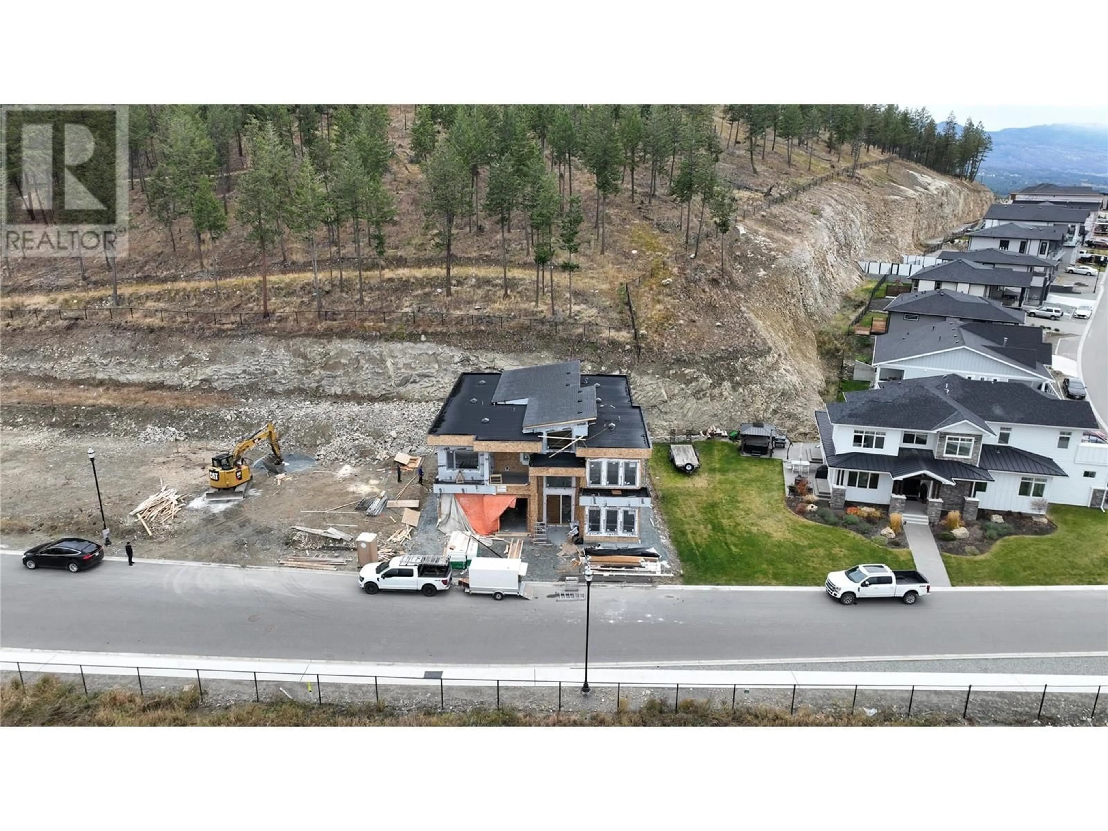 A pic from outside/outdoor area/front of a property/back of a property/a pic from drone, mountain view for 2095 CORTINA DRIVE, Kelowna British Columbia V1P1V1