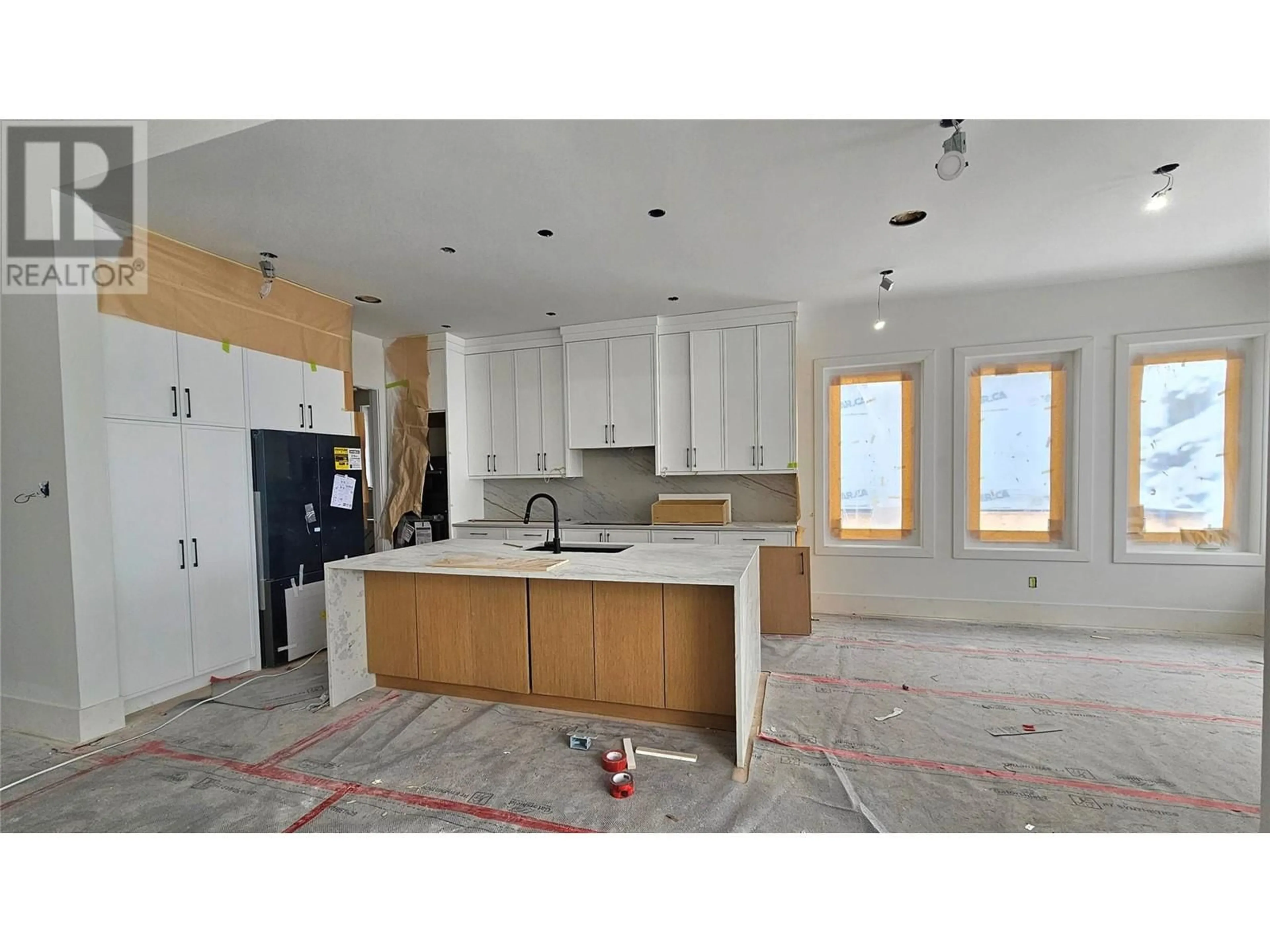 Open concept kitchen, ceramic/tile floor for 2095 CORTINA DRIVE, Kelowna British Columbia V1P1V1