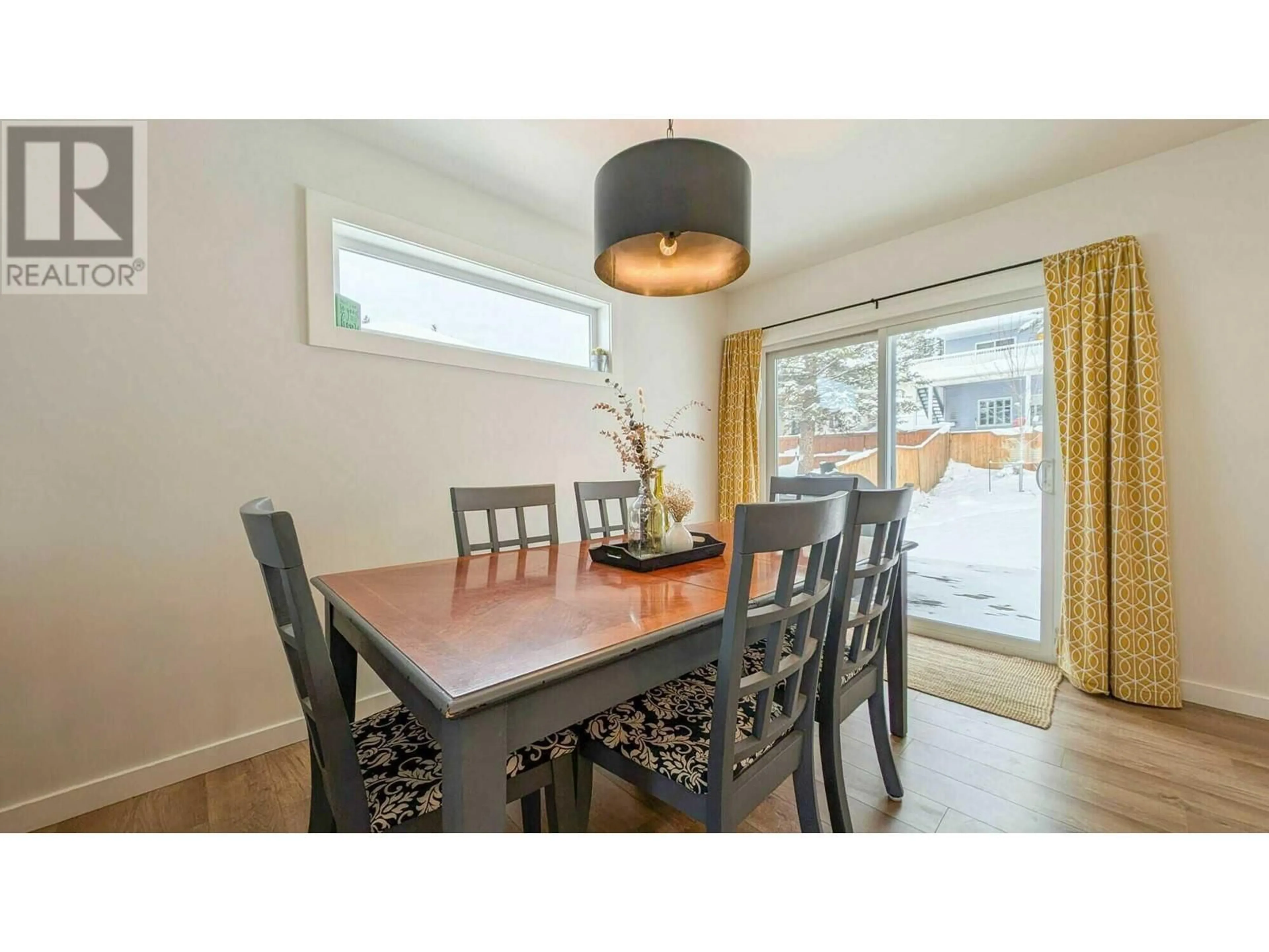 Dining room, wood floors, cottage for 1652 Mt Pyramid Crescent, Cranbrook British Columbia V1C6N6