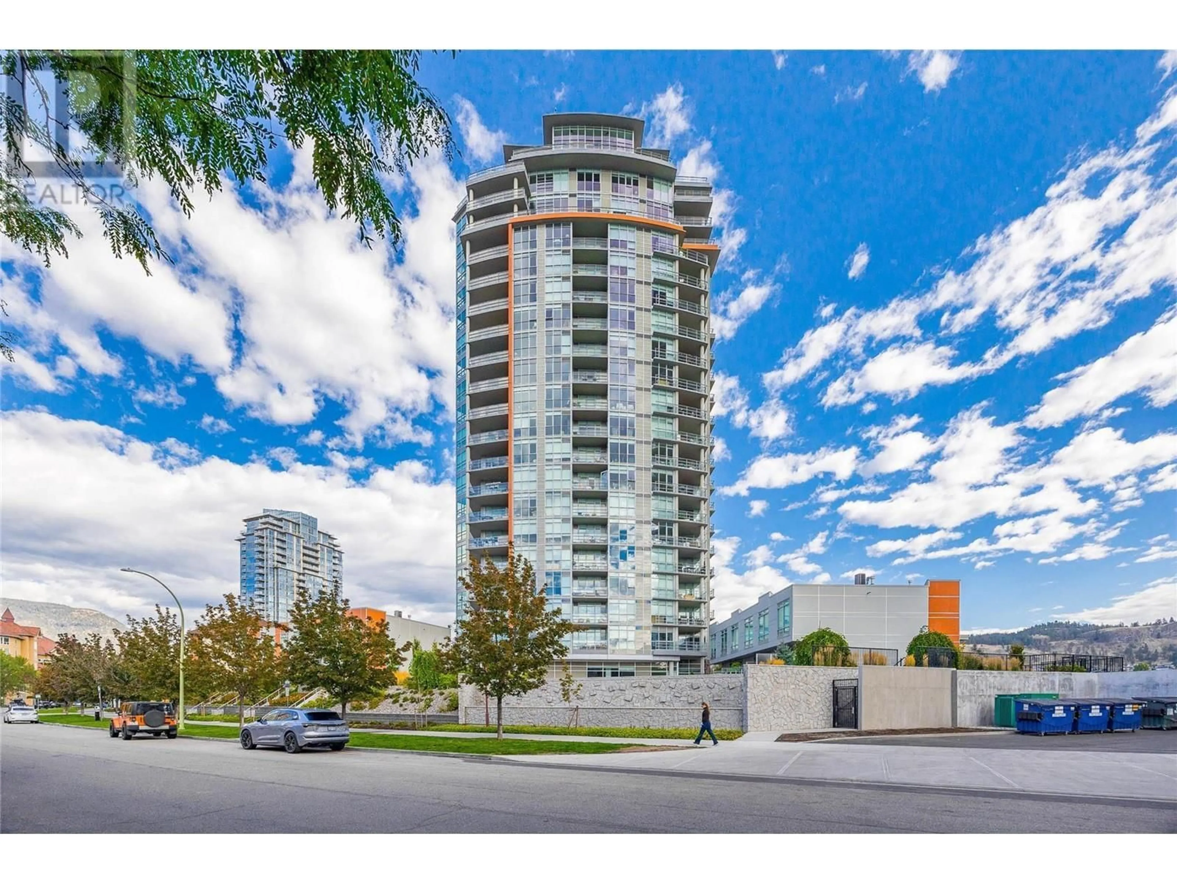 A pic from exterior of the house or condo, the street view for 1151 Sunset Drive Unit# 1004, Kelowna British Columbia V1Y9Z5