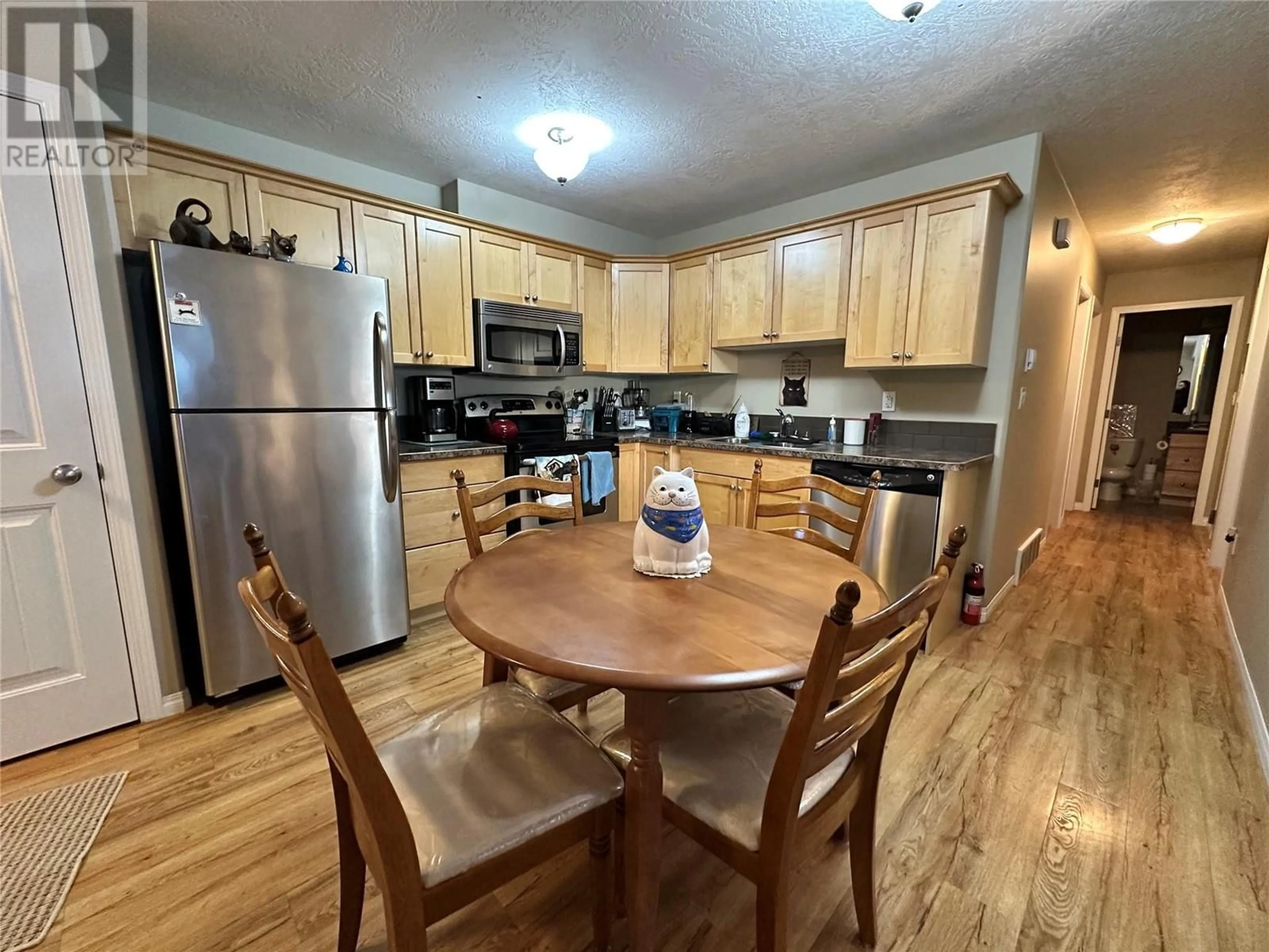 Open concept kitchen for 805 96 Avenue Unit# 3, Dawson Creek British Columbia V1G0C5