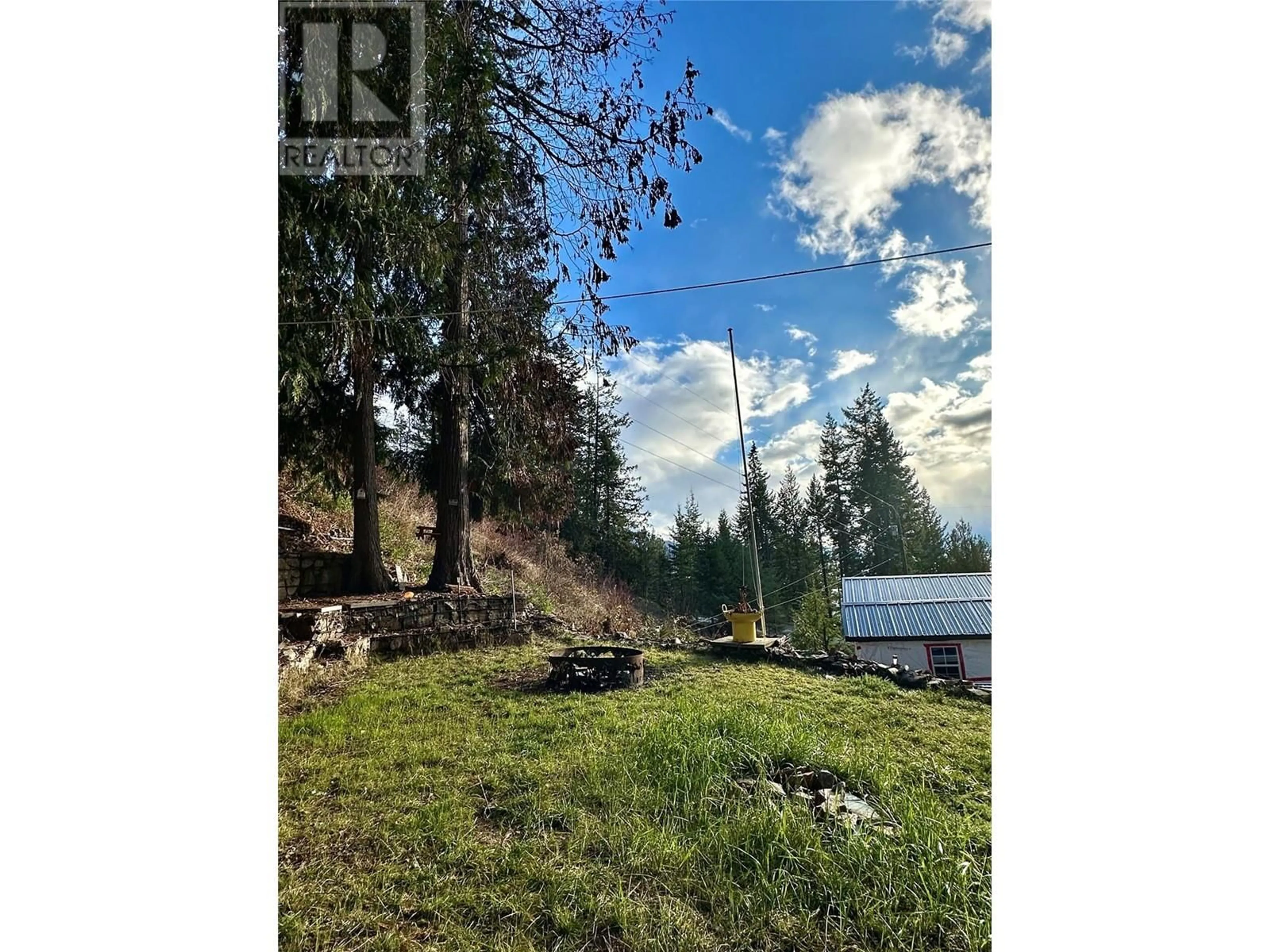 A pic from outside/outdoor area/front of a property/back of a property/a pic from drone, water/lake/river/ocean view for 4265 WOODBURY VILLAGE Road, Ainsworth British Columbia V0G1A0