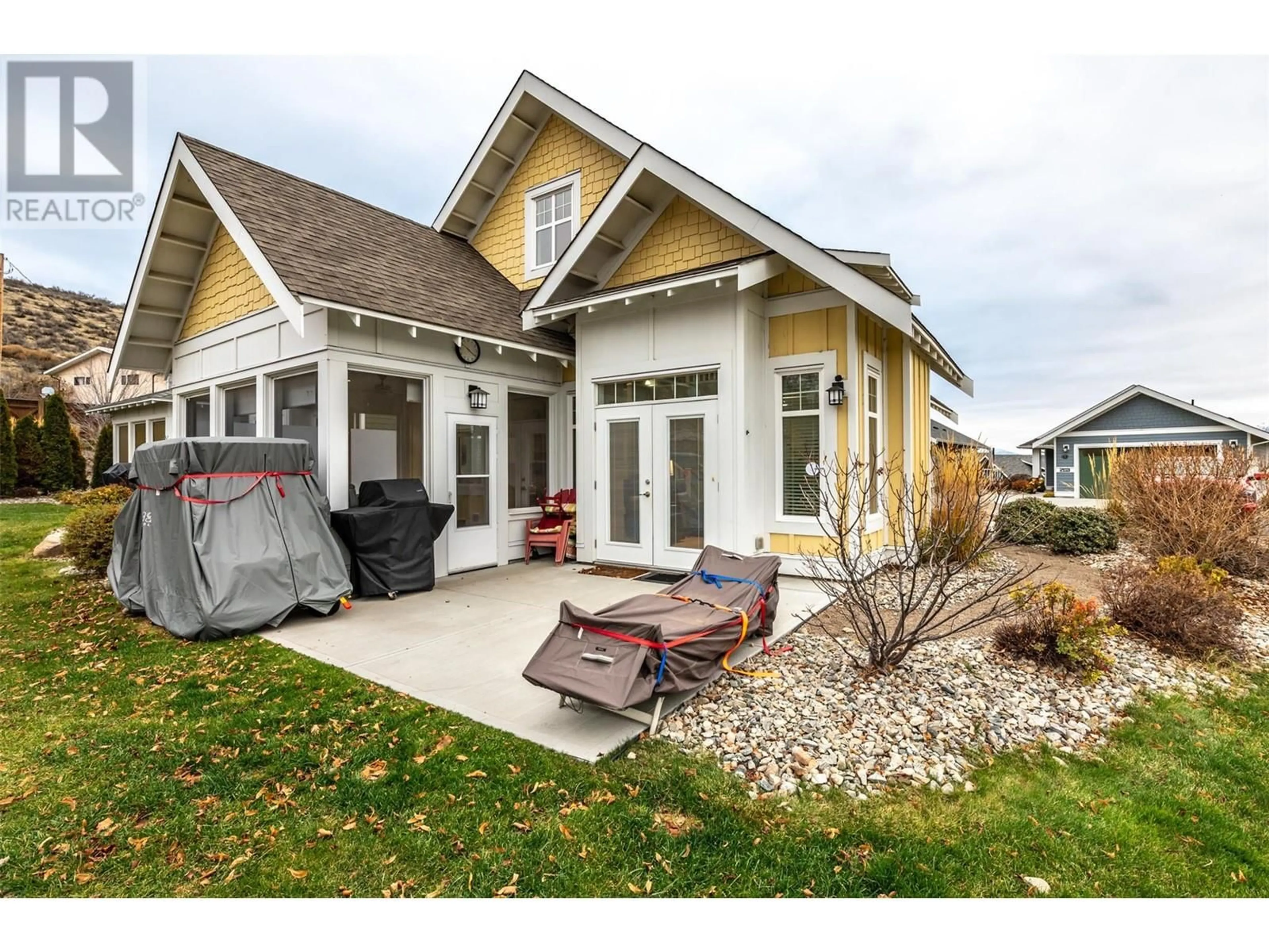 Home with vinyl exterior material, street for 90 - 2450 RADIO TOWER ROAD, Oliver British Columbia V0H1T1