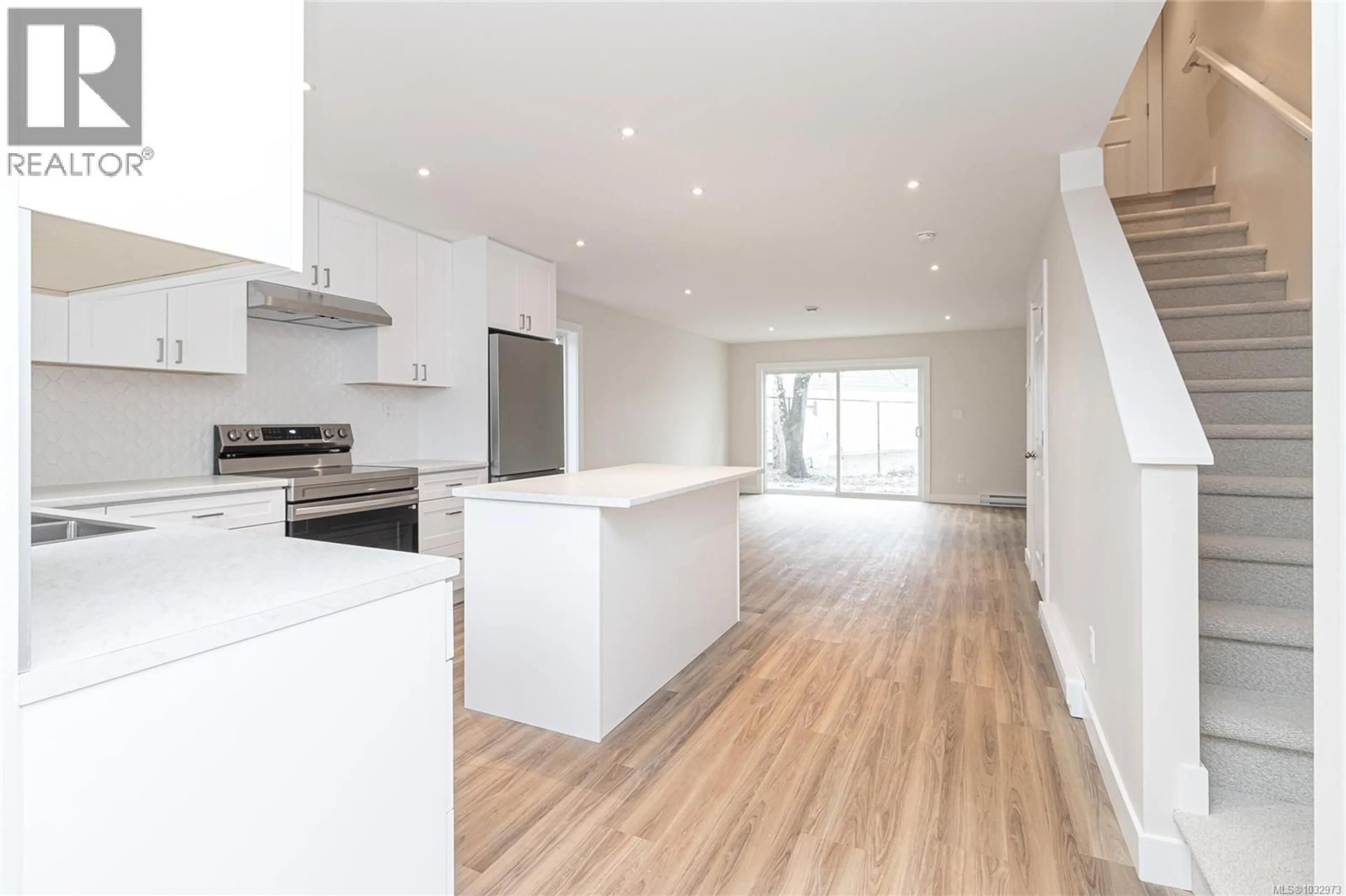 Open concept kitchen, wood/laminate floor for 1117 GOLDSTREAM AVENUE, Langford British Columbia V9B2N4