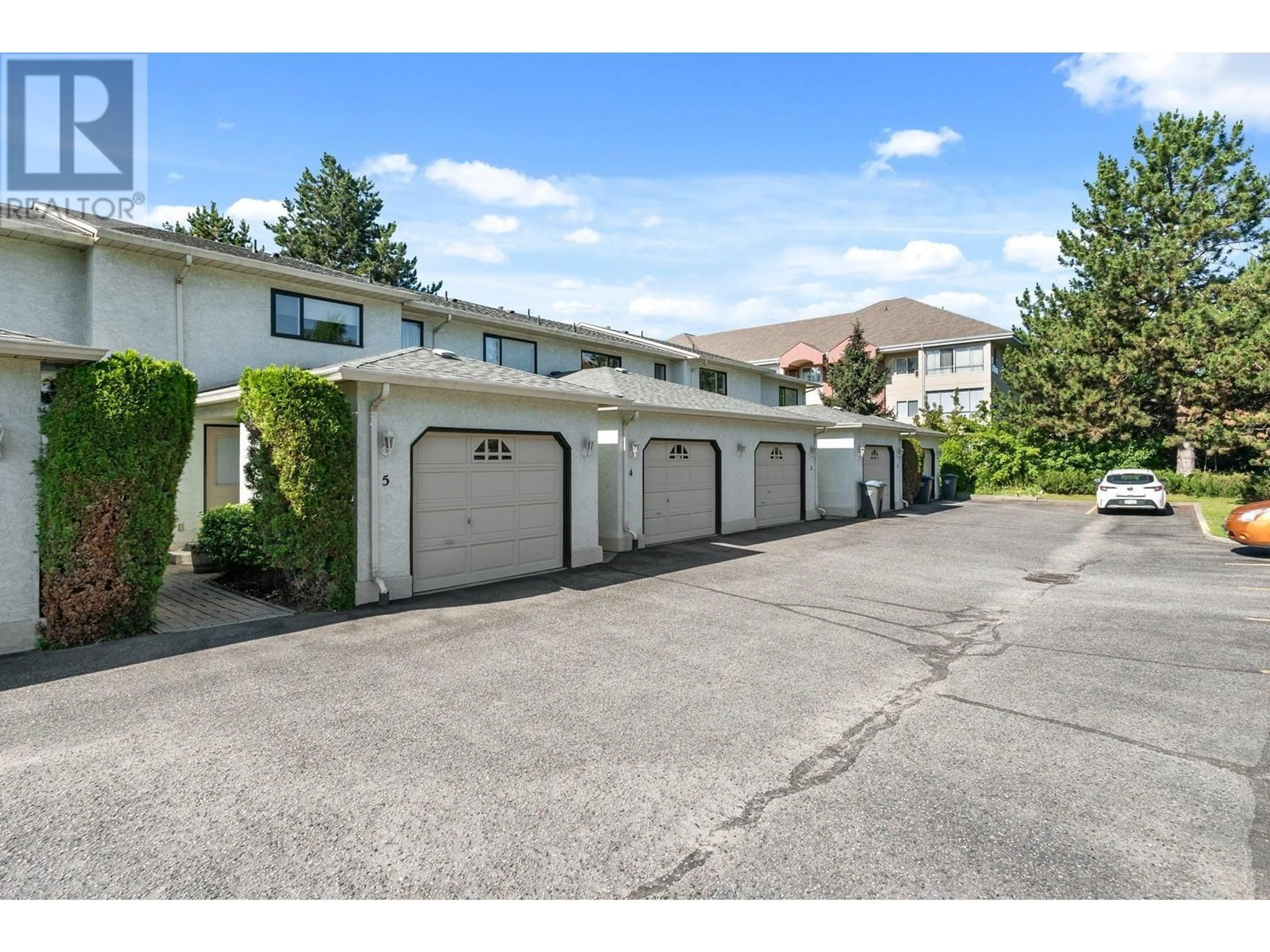 A pic from exterior of the house or condo, the street view for 130 Dundas Road Unit# 5, Kelowna British Columbia V1W4M4