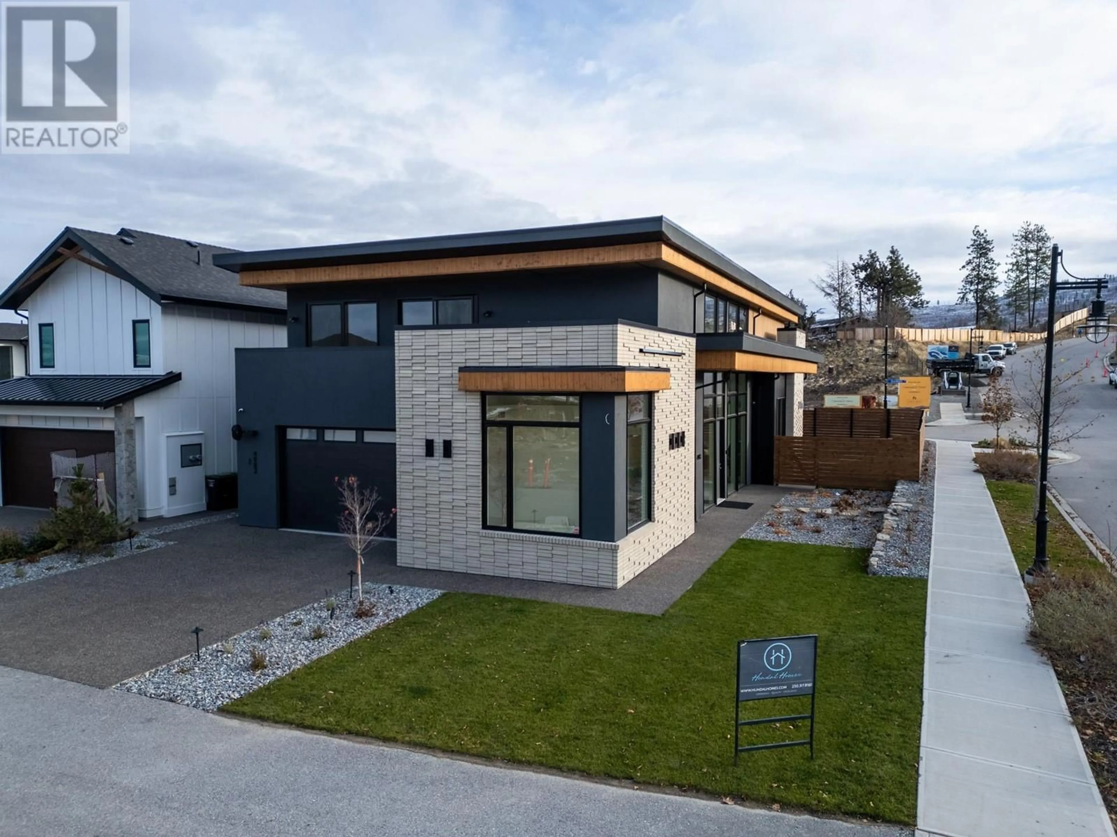 Home with brick exterior material for 4983 Bucktail Lane, Kelowna British Columbia V1W5L3