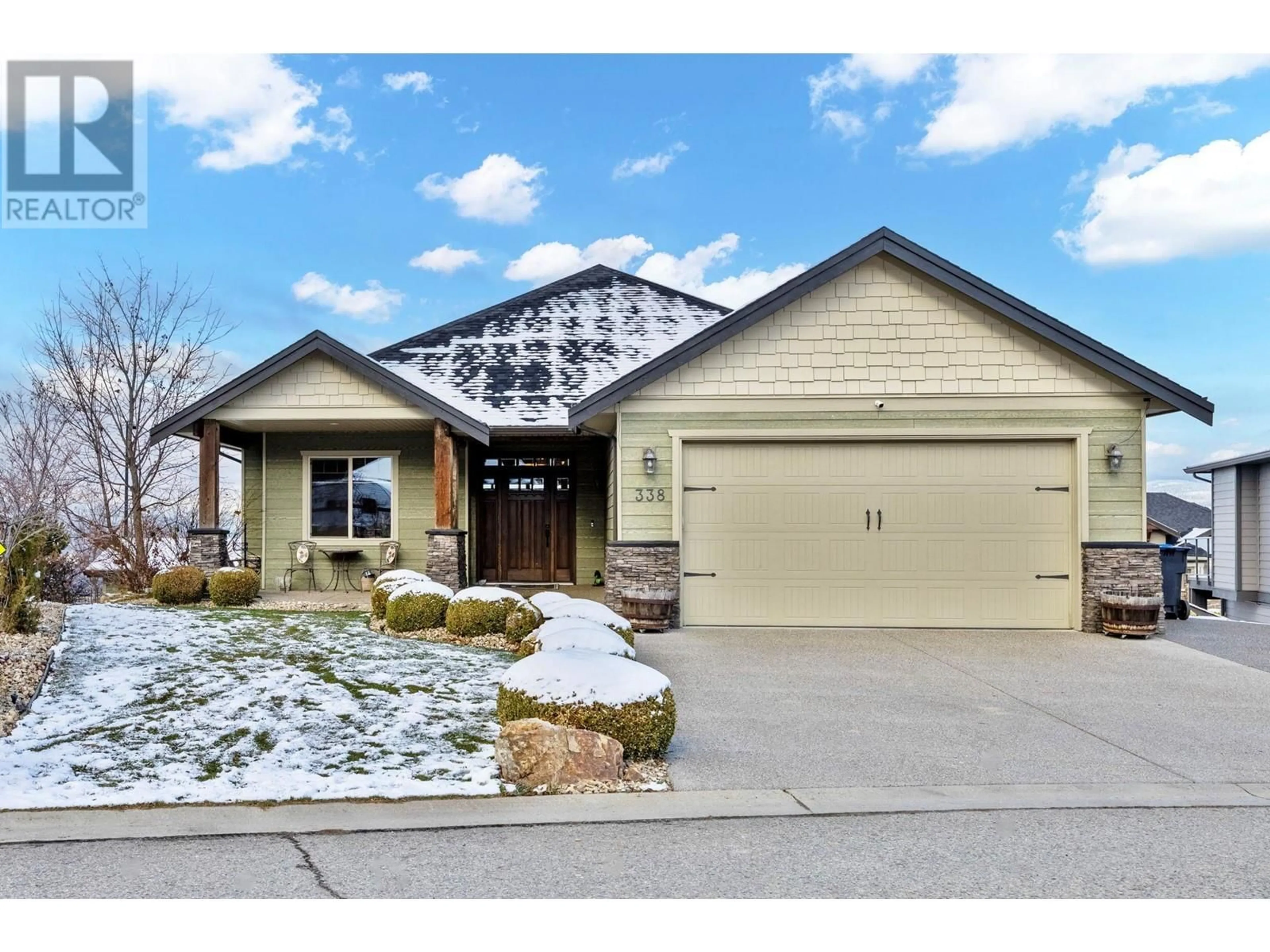 Frontside or backside of a home for 338 Prestwick Lane, Kelowna British Columbia V1P1R7