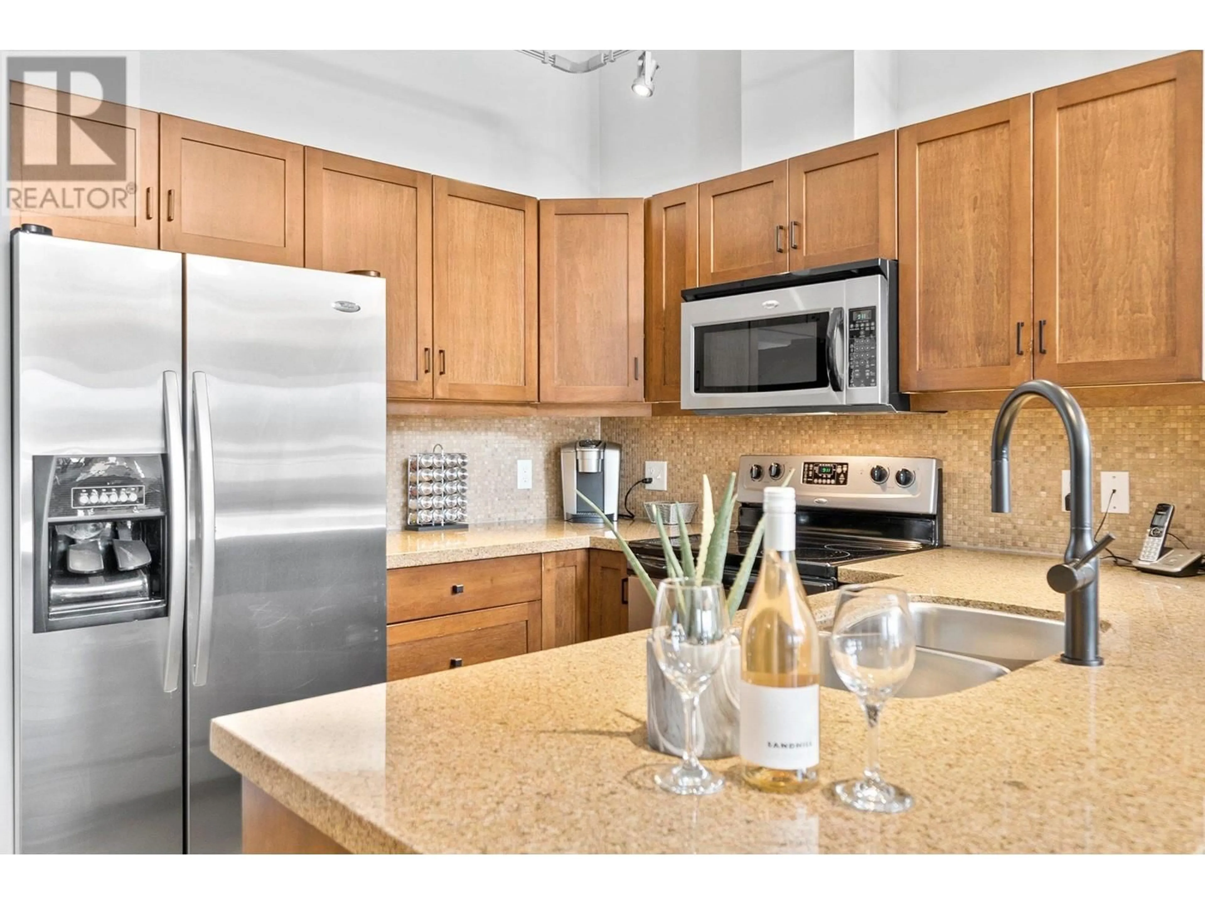 Open concept kitchen, ceramic/tile floor for 638 - 654 COOK ROAD, Kelowna British Columbia V1W3G7