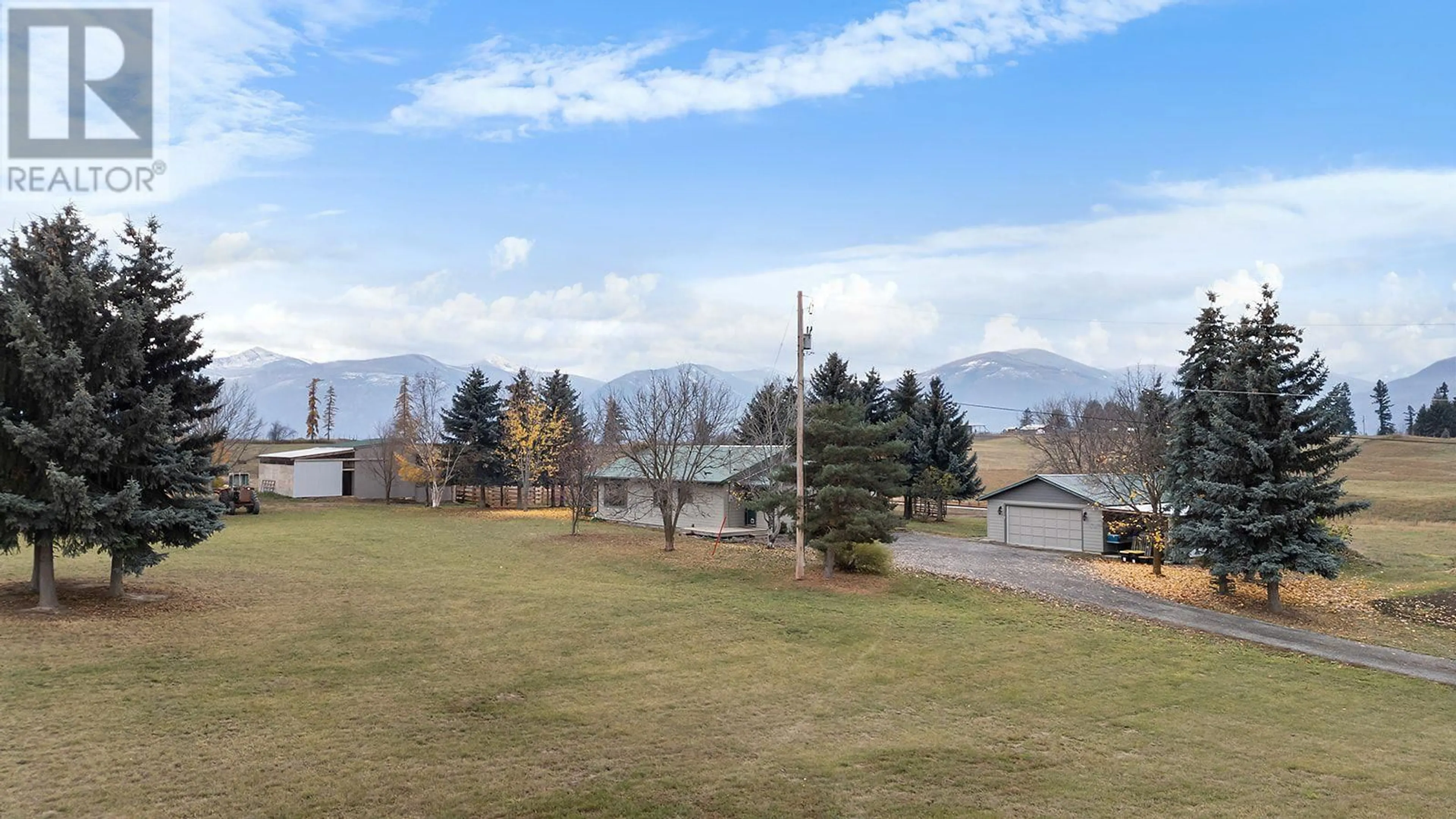 A pic from exterior of the house or condo, the fenced backyard for 2315 16TH Street, Lister British Columbia V0B1G2