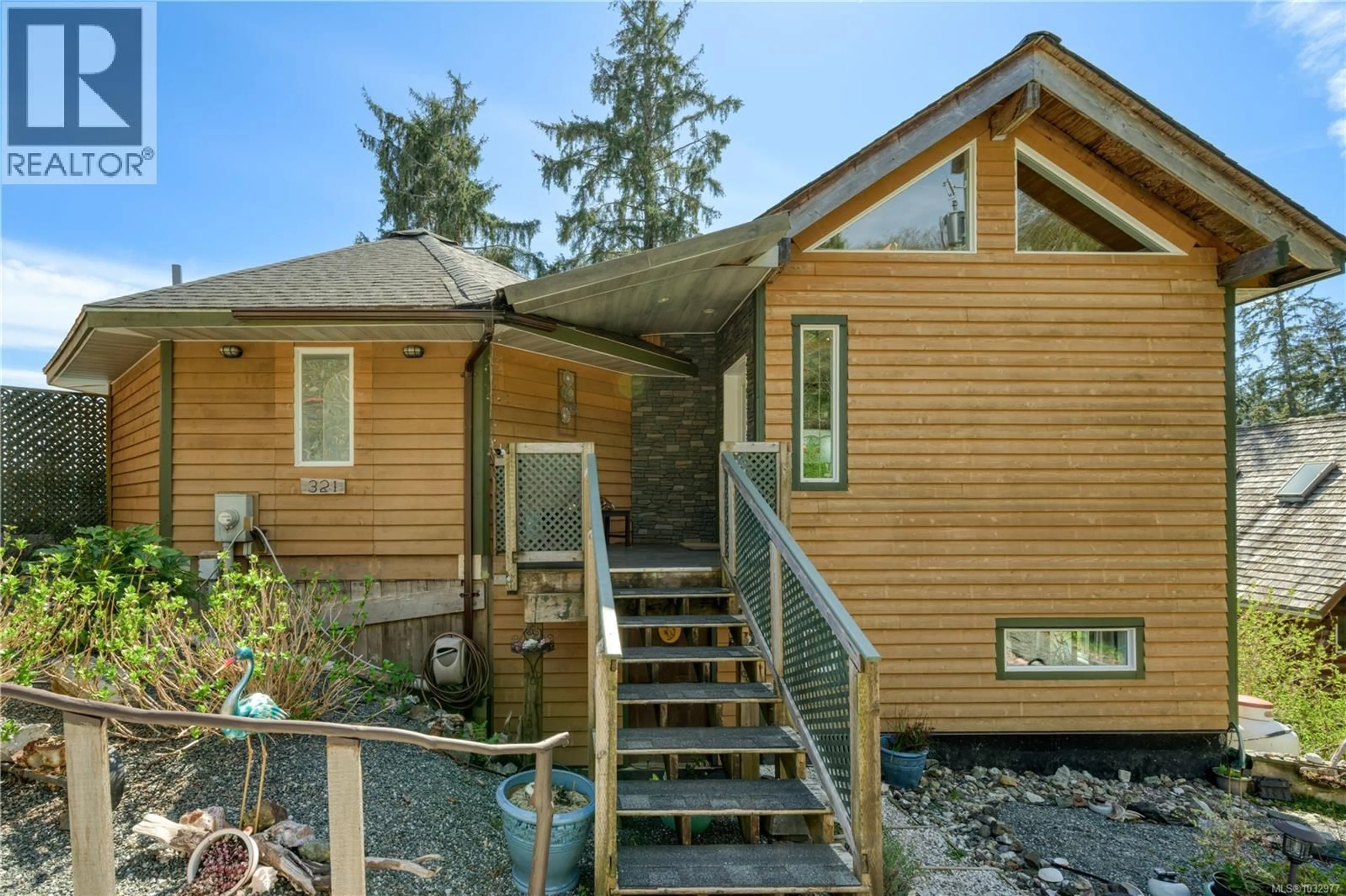 Home with vinyl exterior material, unknown for 321 HARBOUR ROAD, Coal Harbour British Columbia V0N1K0