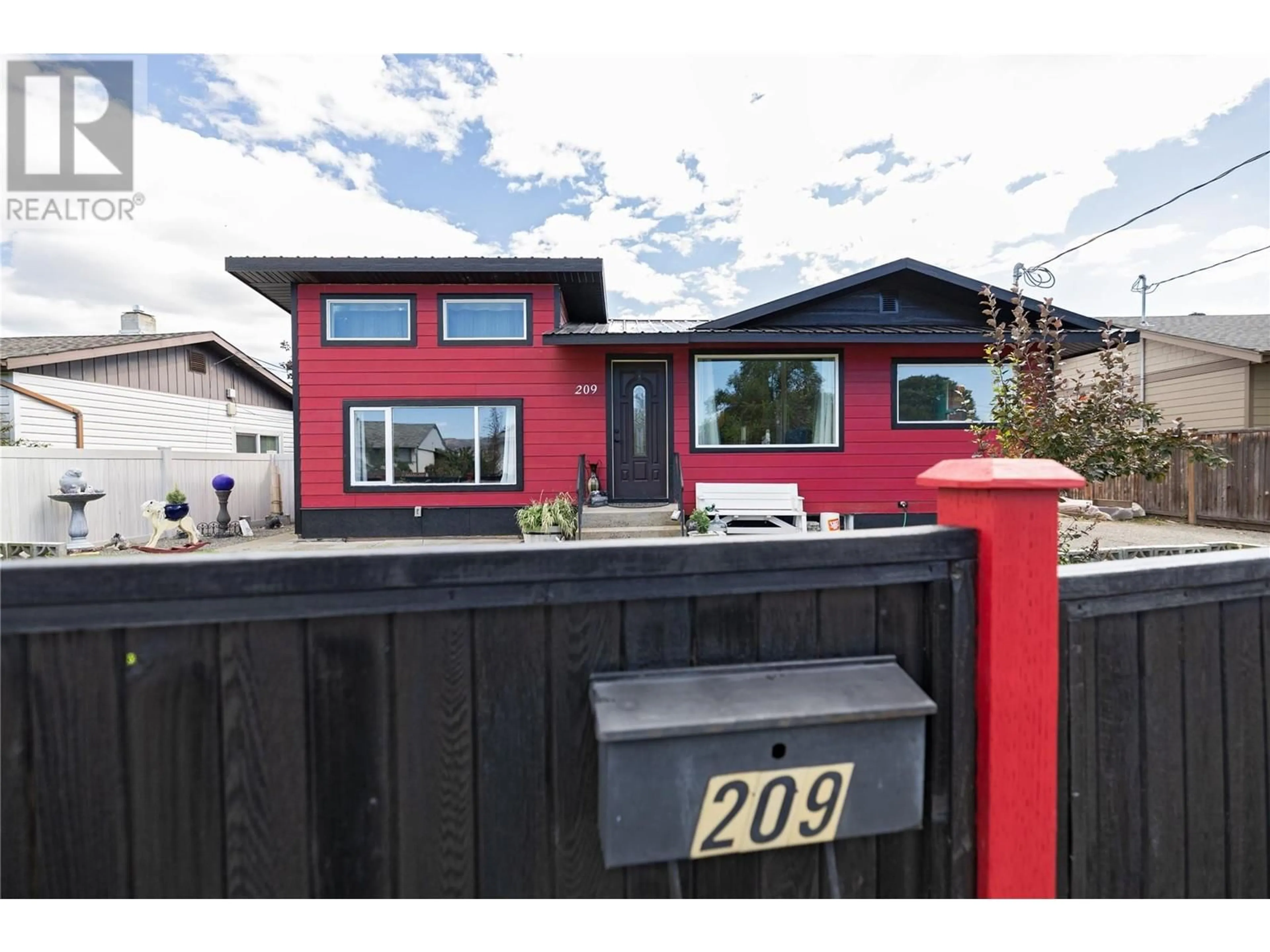 Frontside or backside of a home, the fenced backyard for 209 THRUPP Street, Kamloops British Columbia V2B4B5