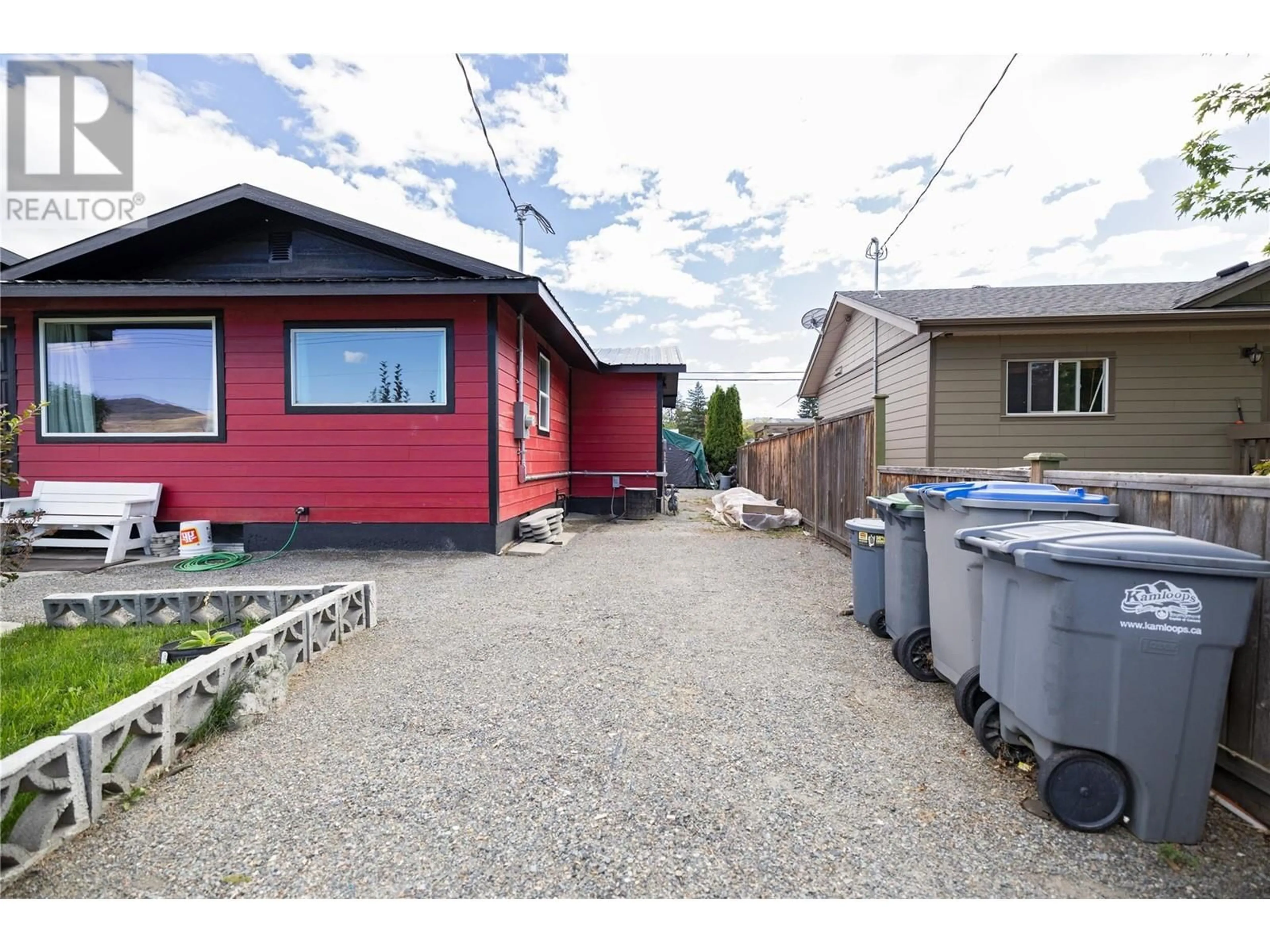 Frontside or backside of a home, the fenced backyard for 209 THRUPP Street, Kamloops British Columbia V2B4B5