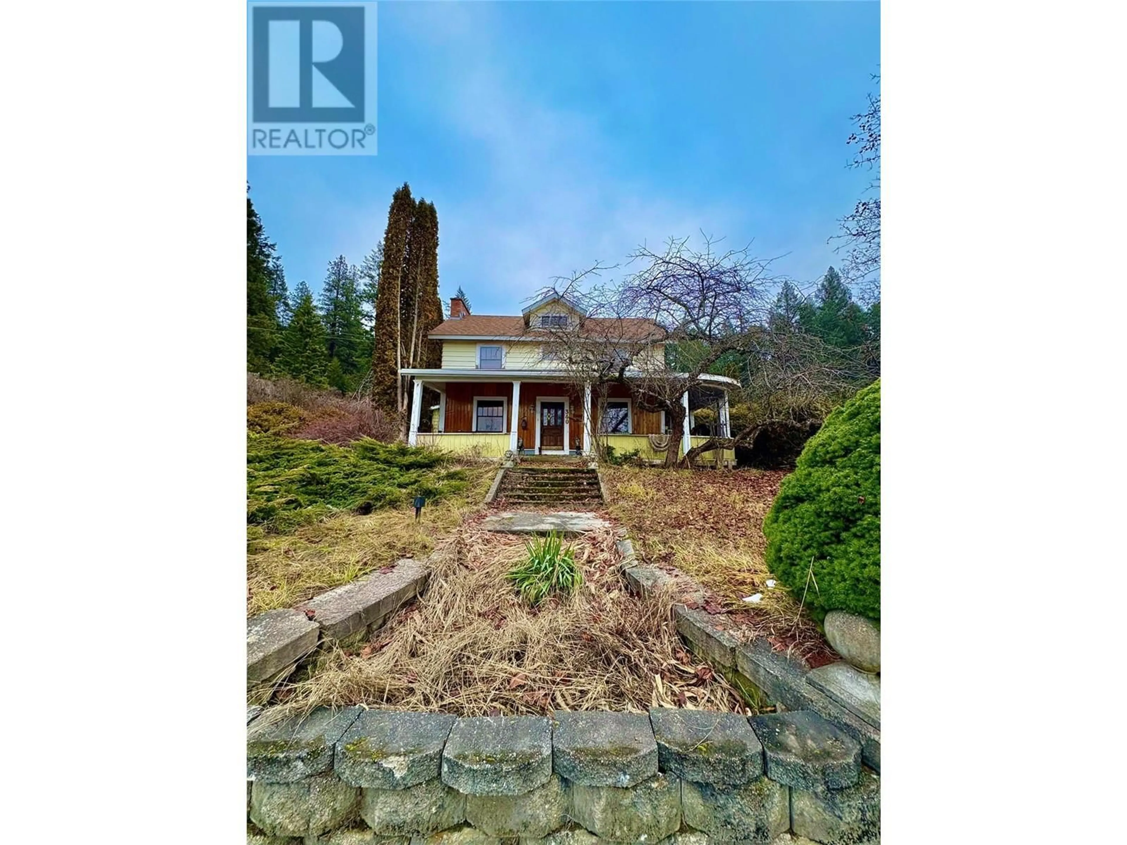 A pic from outside/outdoor area/front of a property/back of a property/a pic from drone, unknown for 340 HIGHWAY 21 HIGHWAY, Creston British Columbia V0B1G2
