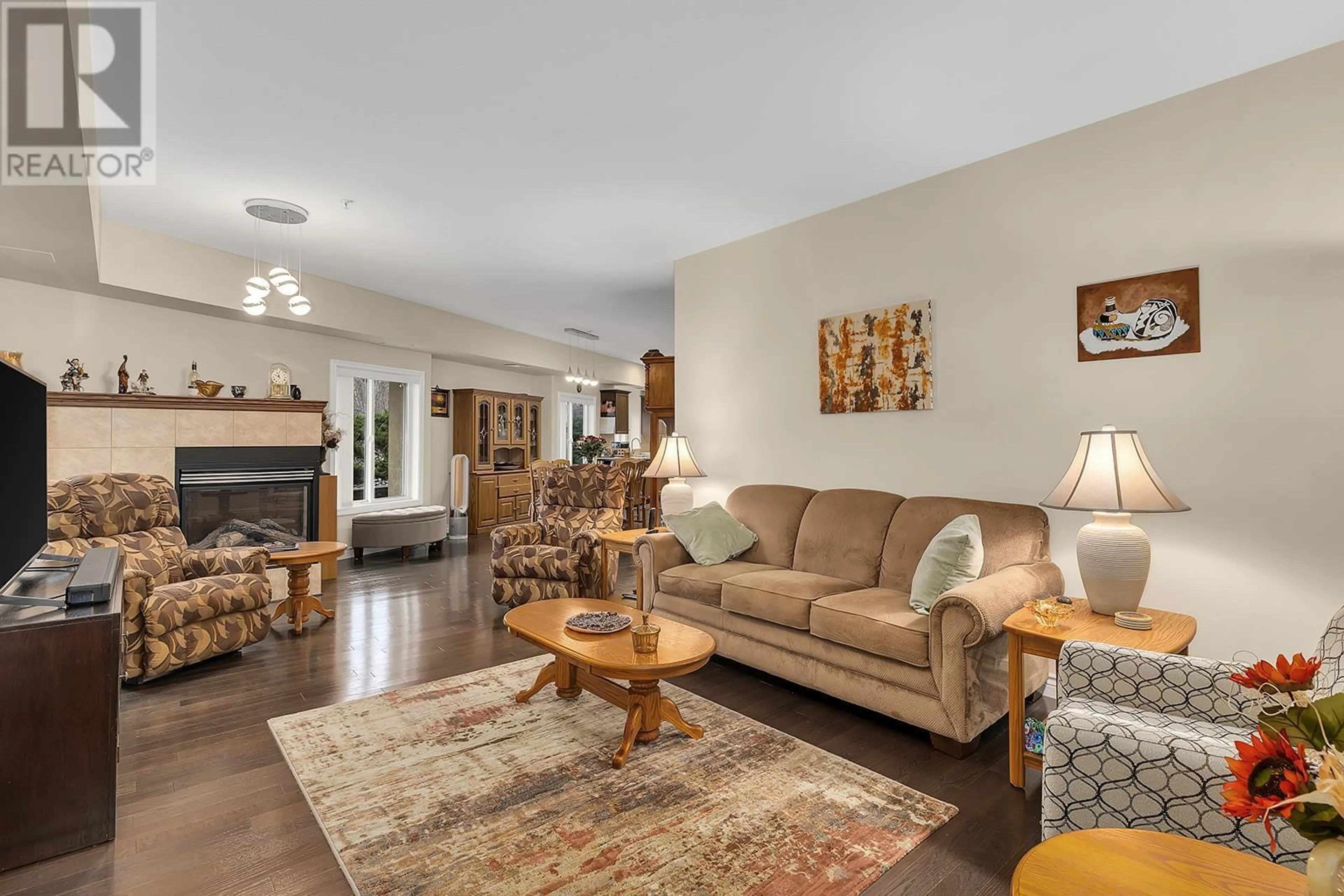 Living room with furniture, unknown for 1961 Durnin Road Unit# 105, Kelowna British Columbia V1X7Z6