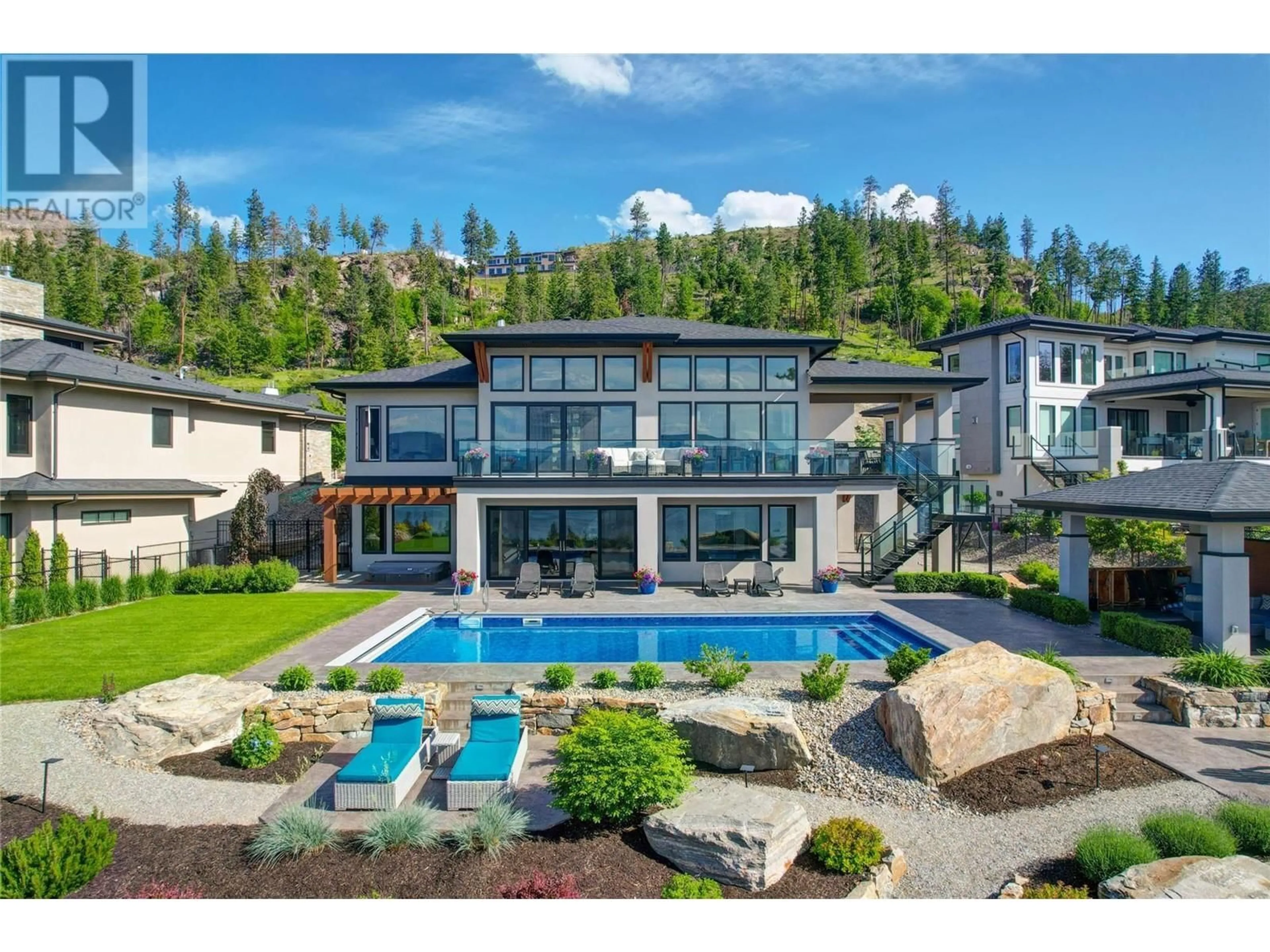 A pic from outside/outdoor area/front of a property/back of a property/a pic from drone, water/lake/river/ocean view for 5710 JASPER WAY, Kelowna British Columbia V1W5L7