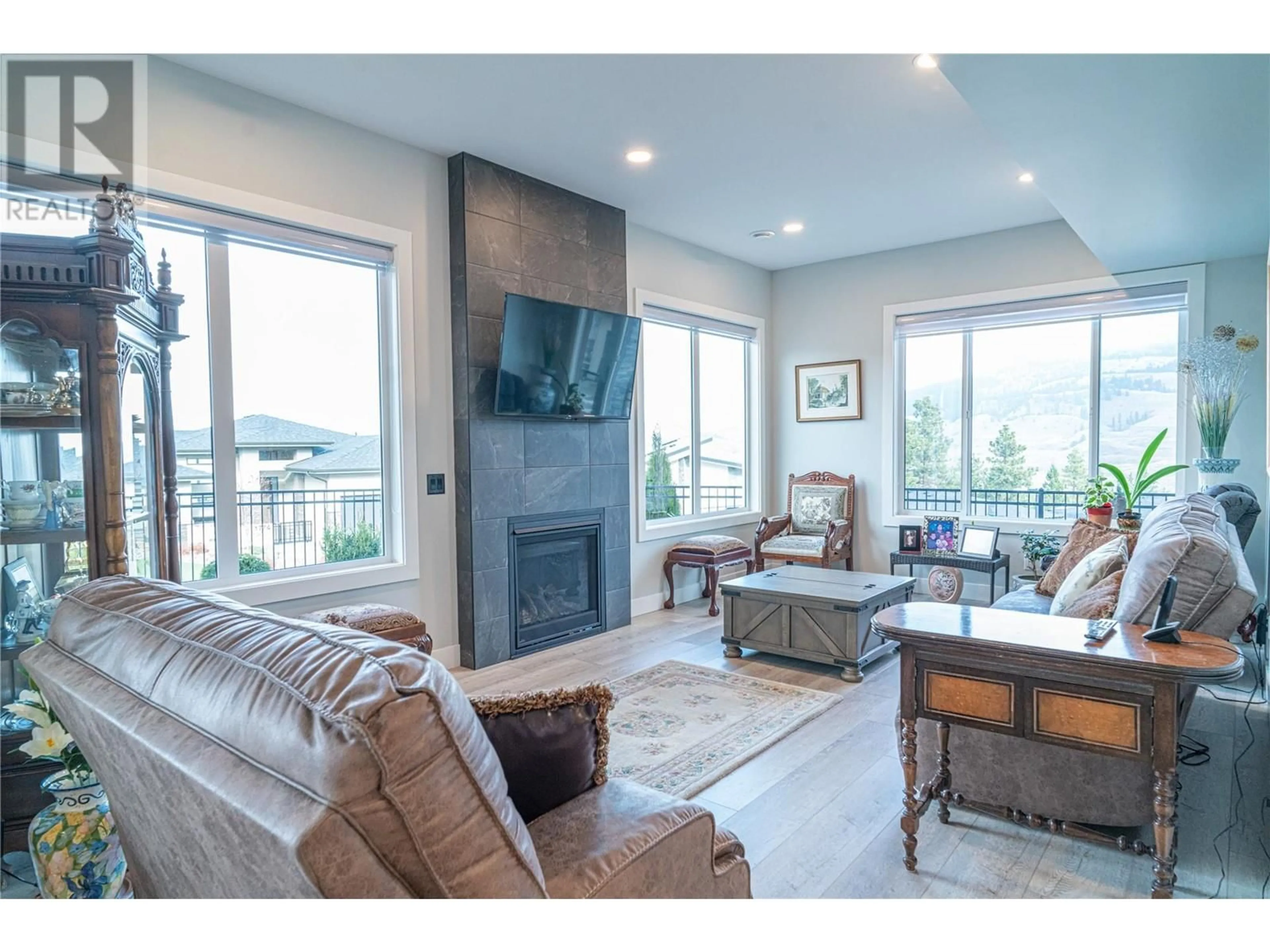 Living room, wood floors for 540 Barra Lane, Kelowna British Columbia V1P1T1