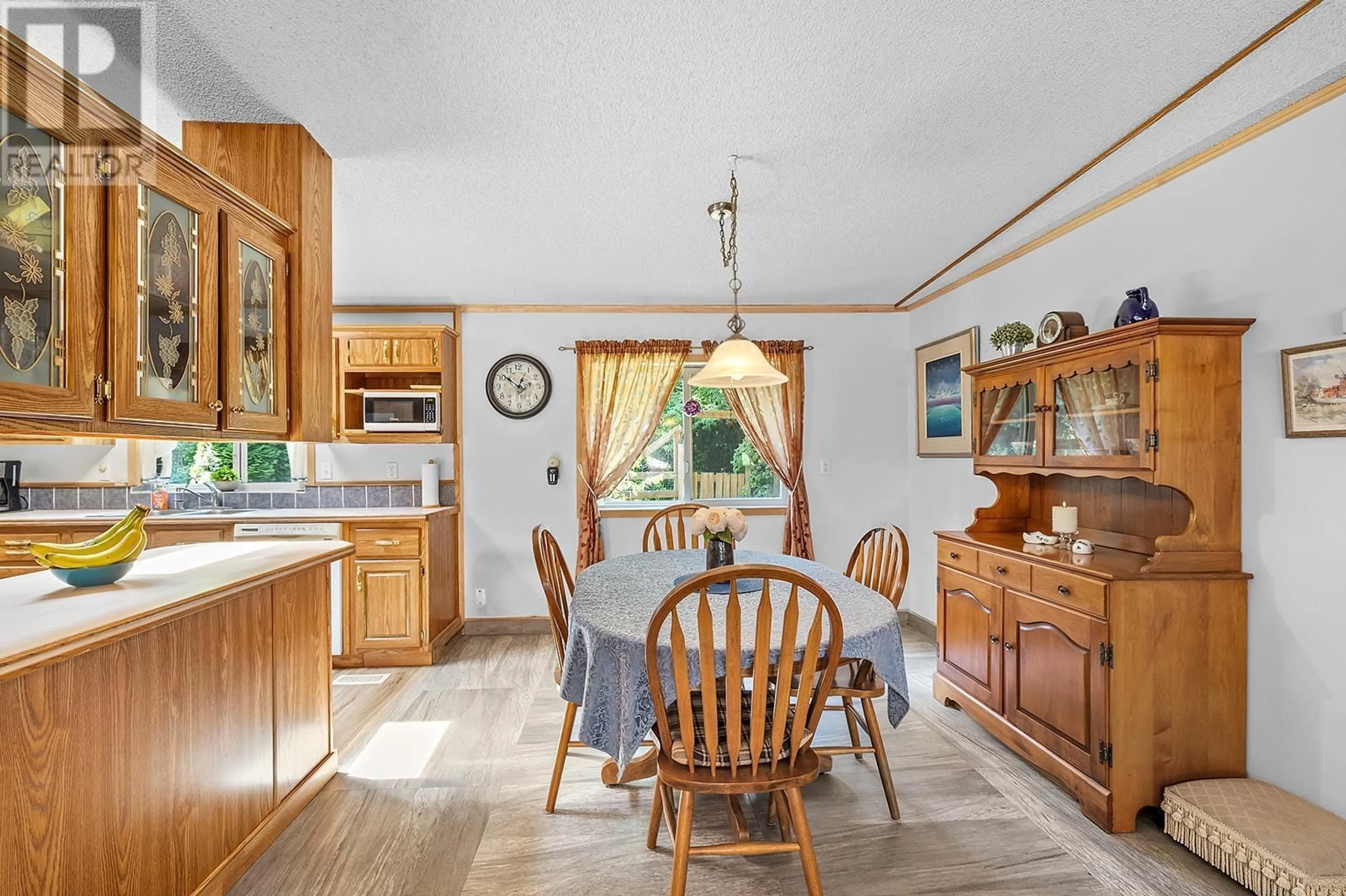 Dining room, wood floors, cottage for 876 BALSAM Road, Creston British Columbia V0B1G7