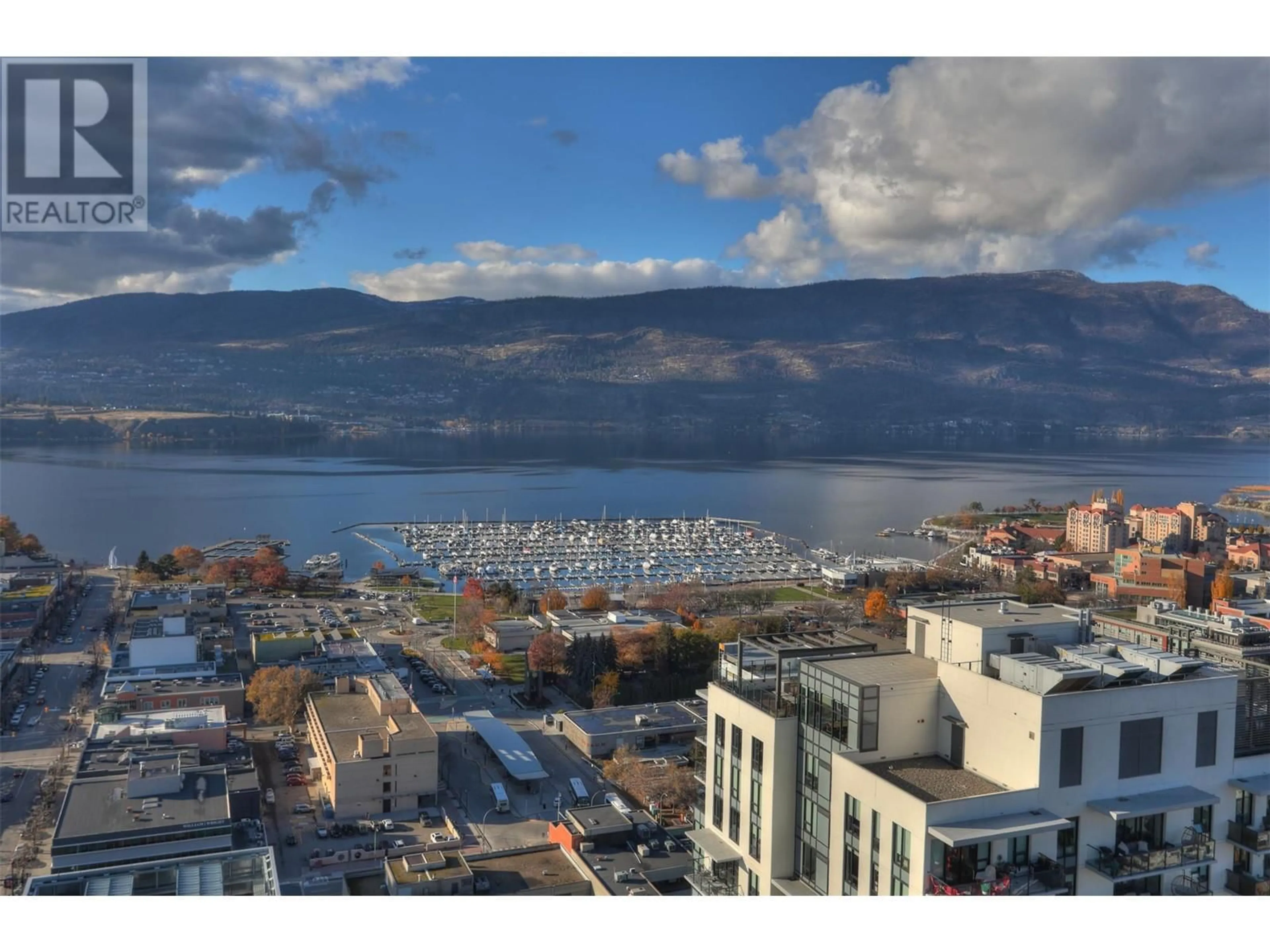 A pic from exterior of the house or condo, lake for 1488 Bertram Street Unit# 3101, Kelowna British Columbia V1Y6P2