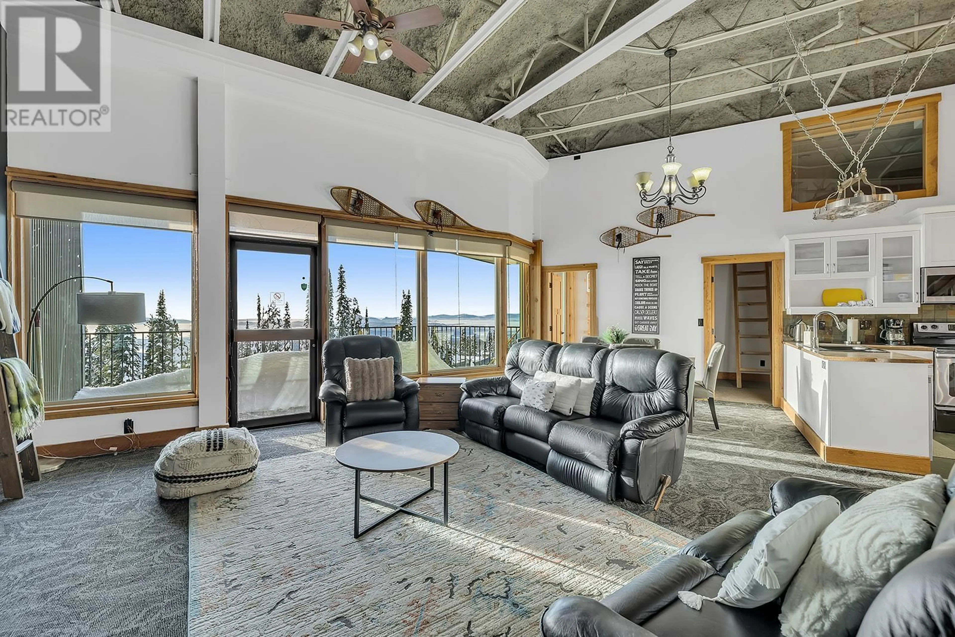 Living room with furniture, cement floor for 500 - 7470 PORCUPINE ROAD, Big White British Columbia V1P1P3