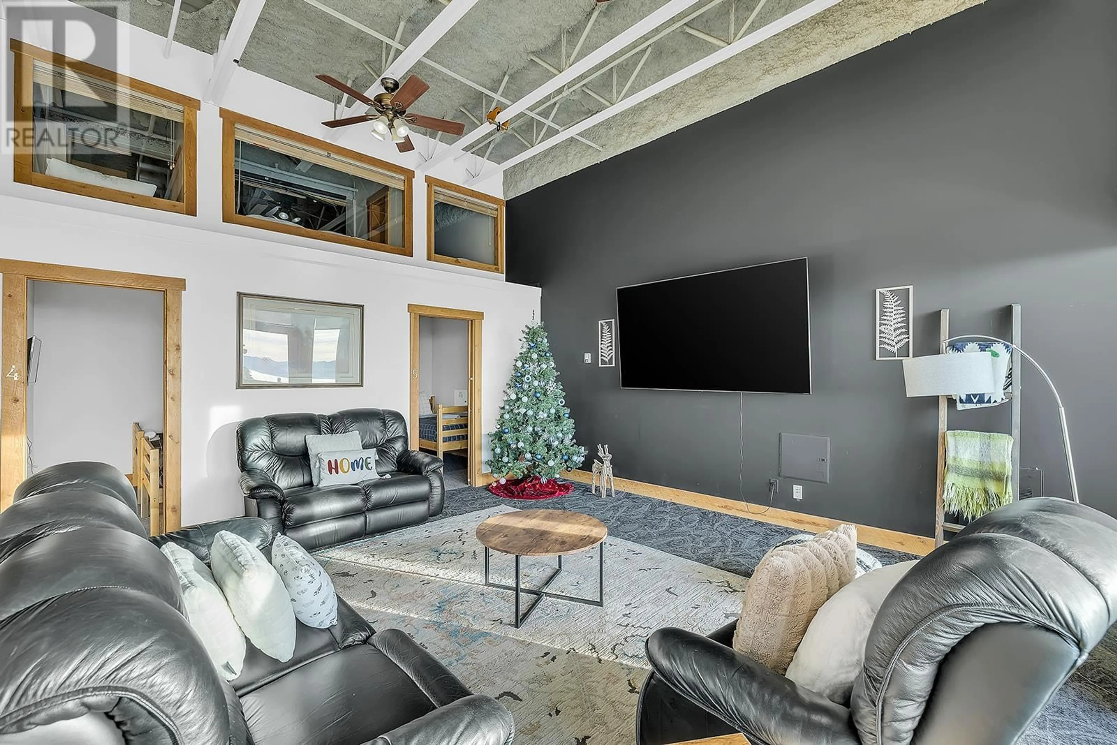Living room with furniture, cement floor for 500 - 7470 PORCUPINE ROAD, Big White British Columbia V1P1P3