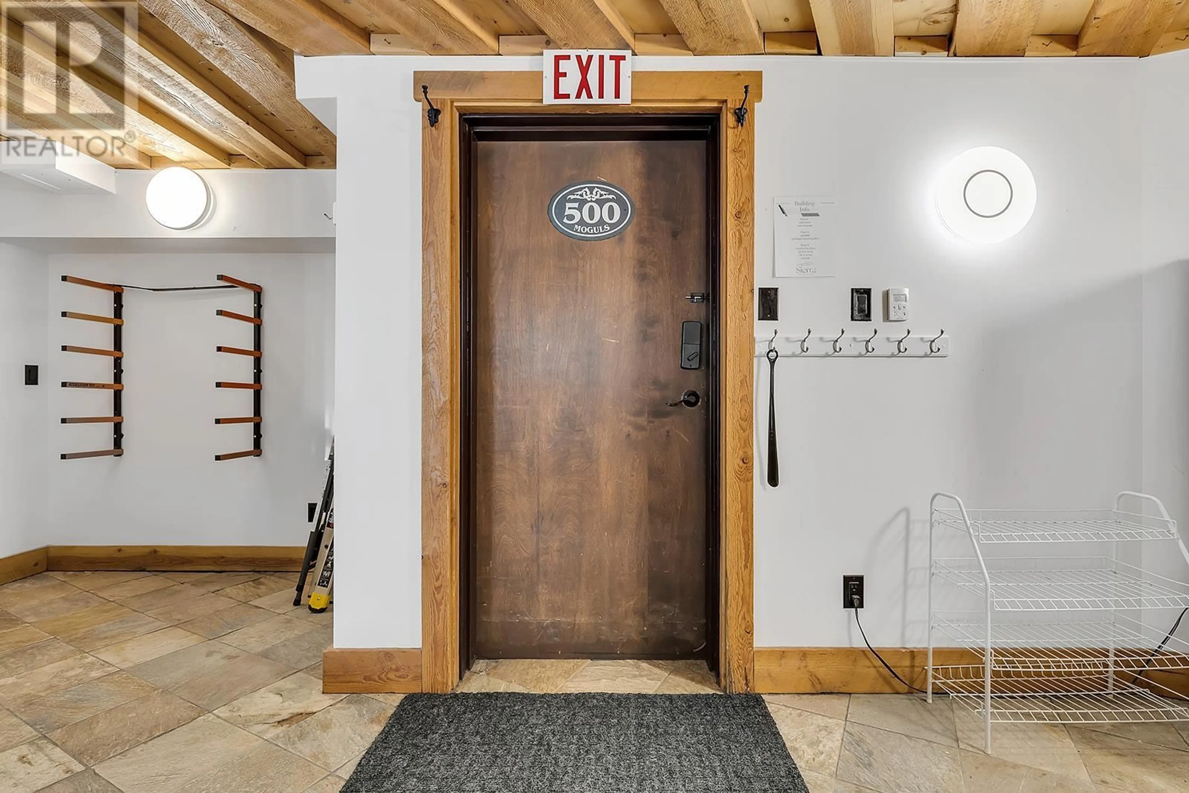 Indoor foyer, wood floors for 7470 Porcupine Road Unit# 500, Big White British Columbia V1P1P3