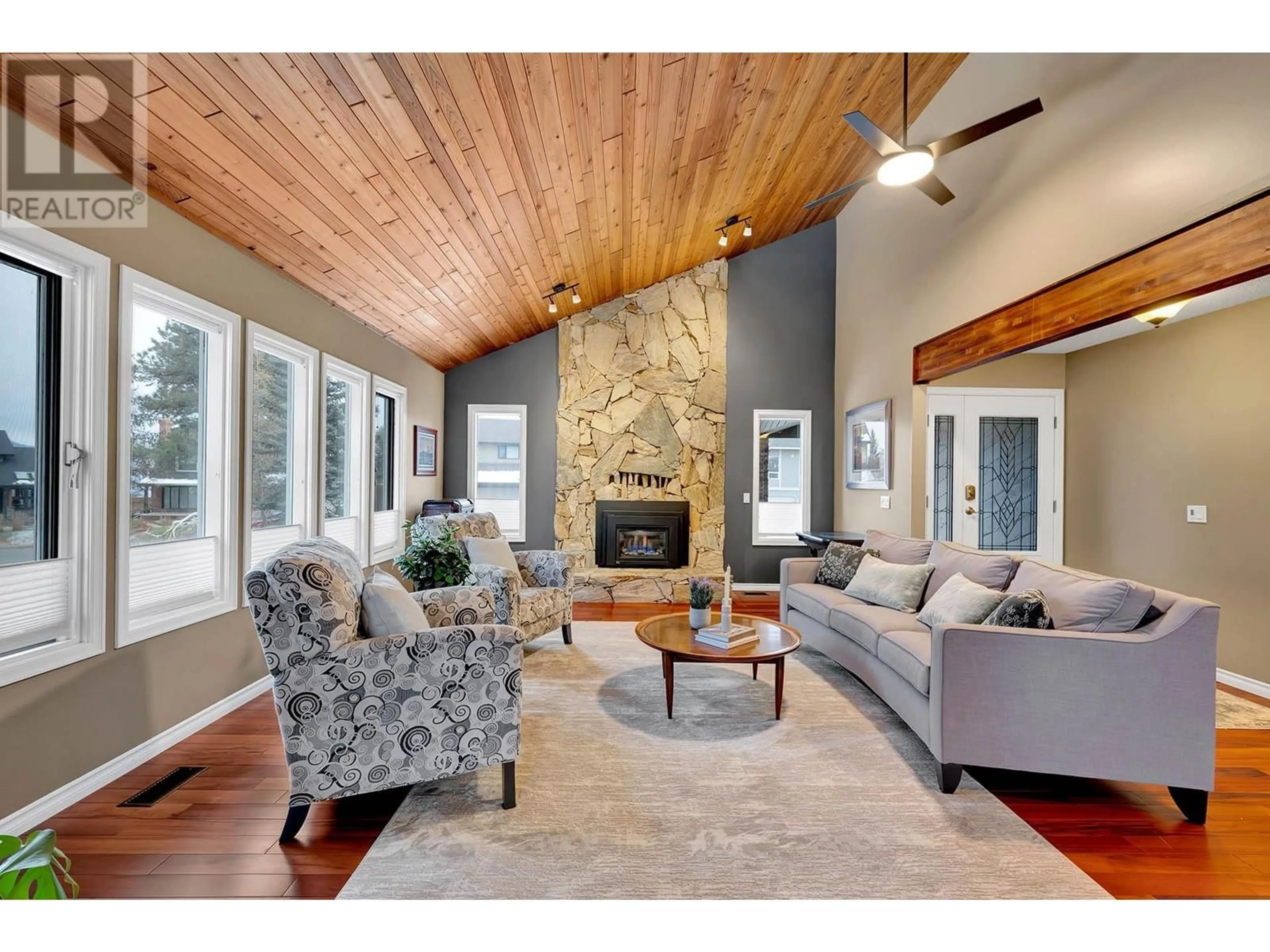 Living room with furniture, wood/laminate floor for 1874 CATHEDRAL Court, Kamloops British Columbia V2E2A7