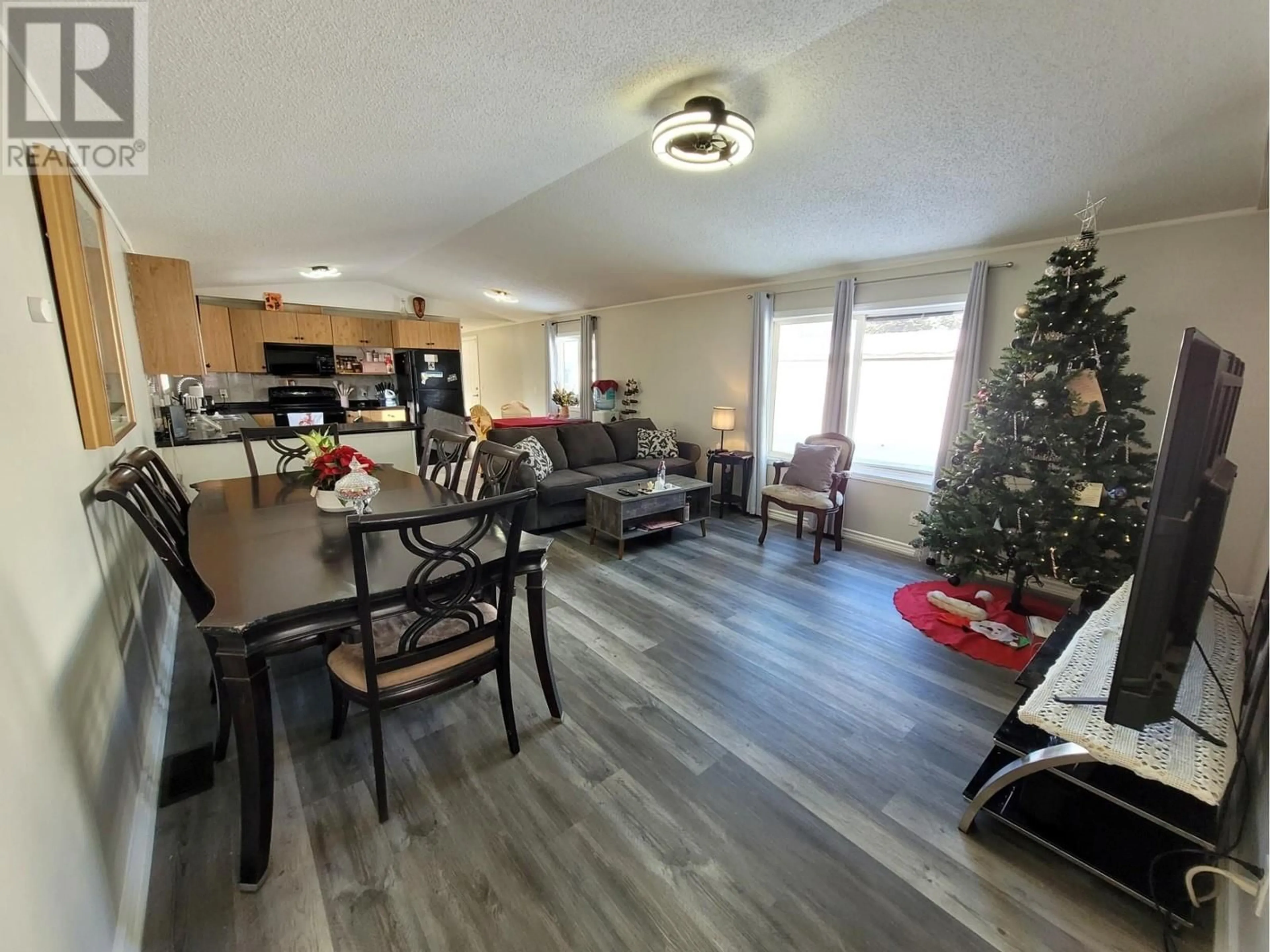 A pic of a room, wood floors for 100 Aspen Drive Unit# 12, Sparwood British Columbia V0B2G0