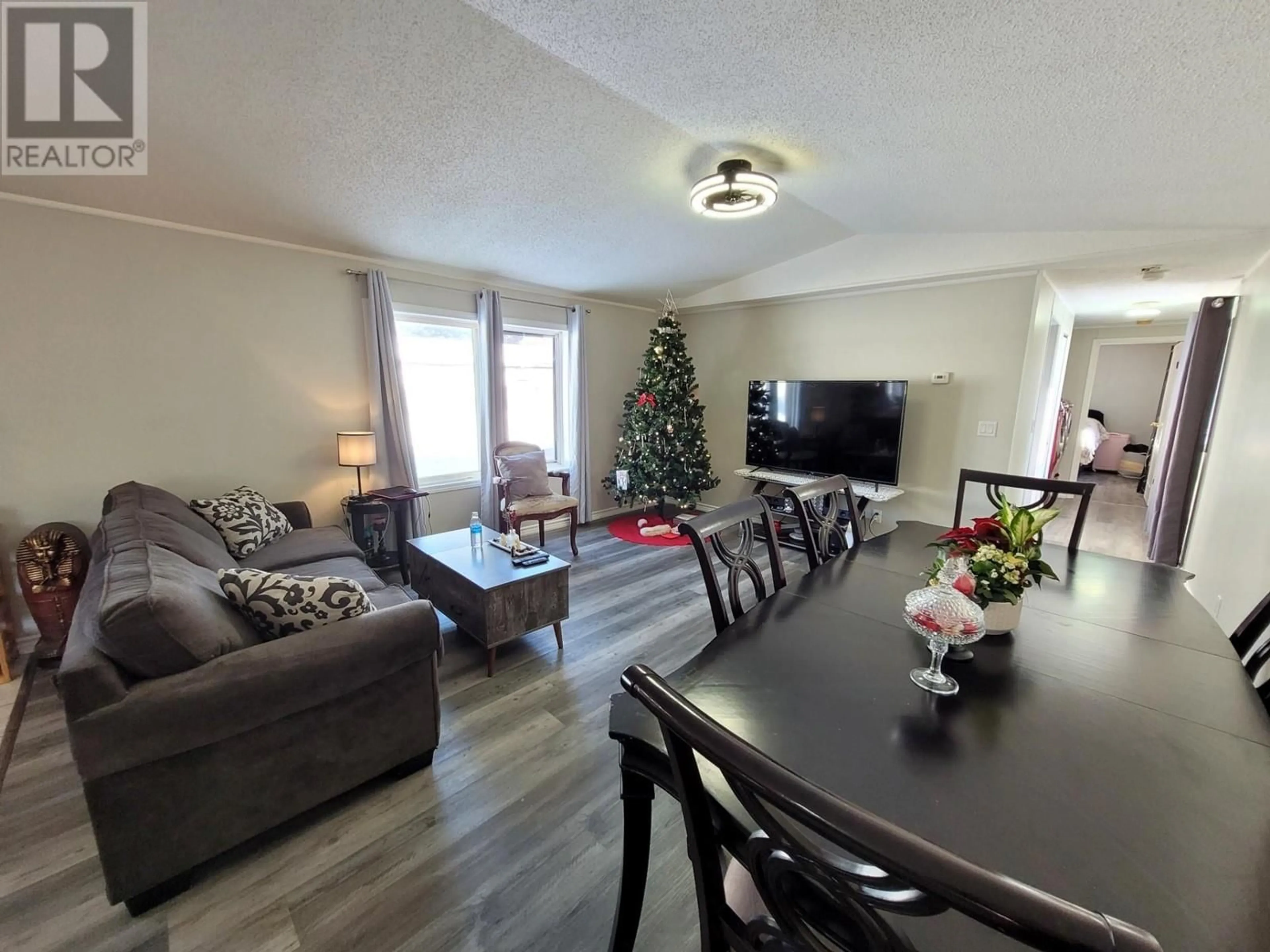 A pic of a room, wood floors for 100 Aspen Drive Unit# 12, Sparwood British Columbia V0B2G0