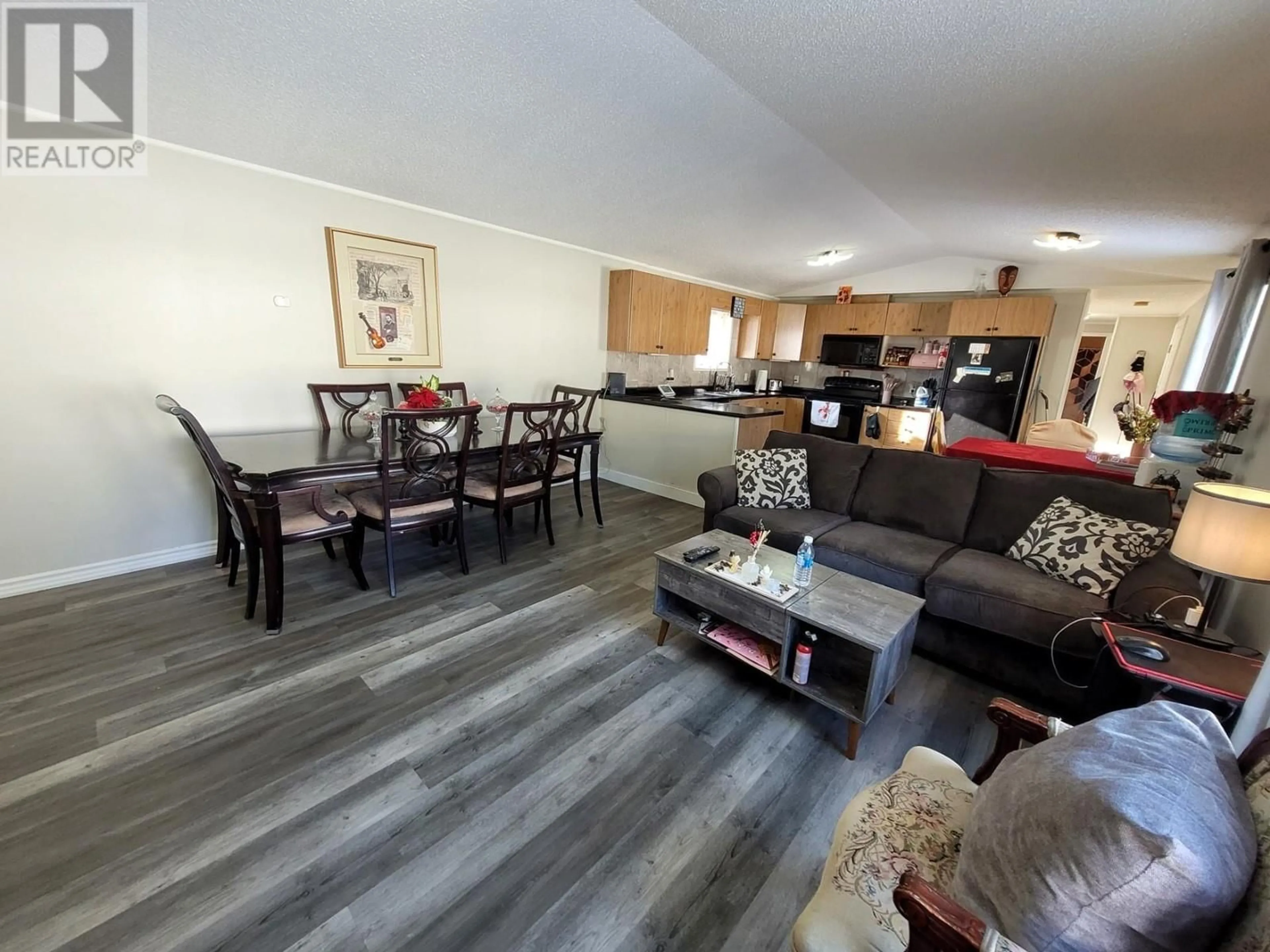 A pic of a room, wood floors for 100 Aspen Drive Unit# 12, Sparwood British Columbia V0B2G0