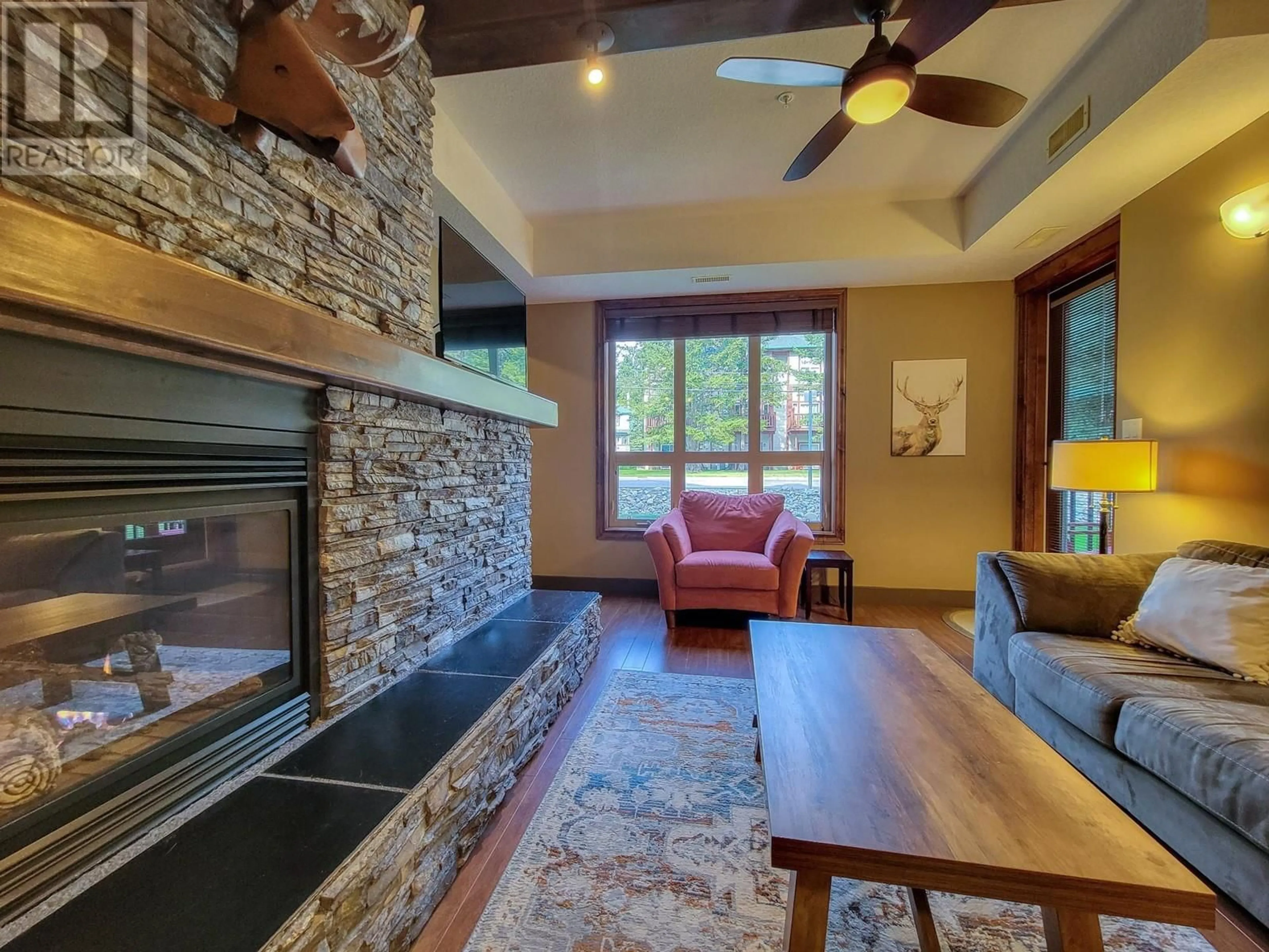 Indoor lobby, wood floors for 7495 COLUMBIA Avenue Unit# 1109, Radium Hot Springs British Columbia V0A1M0