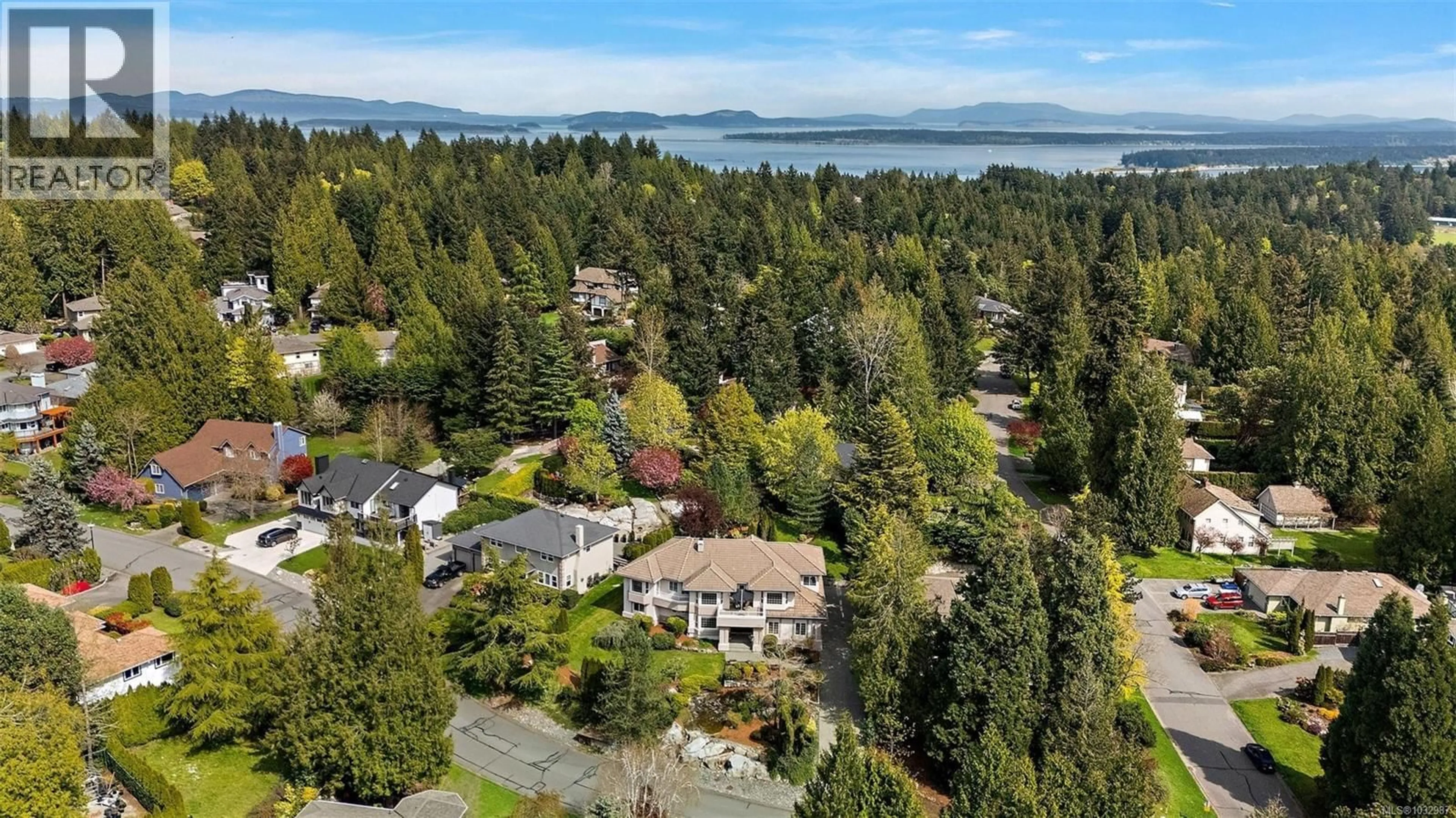 A pic from outside/outdoor area/front of a property/back of a property/a pic from drone, water/lake/river/ocean view for 8593 KINGCOME CRESCENT, North Saanich British Columbia V8L5C4